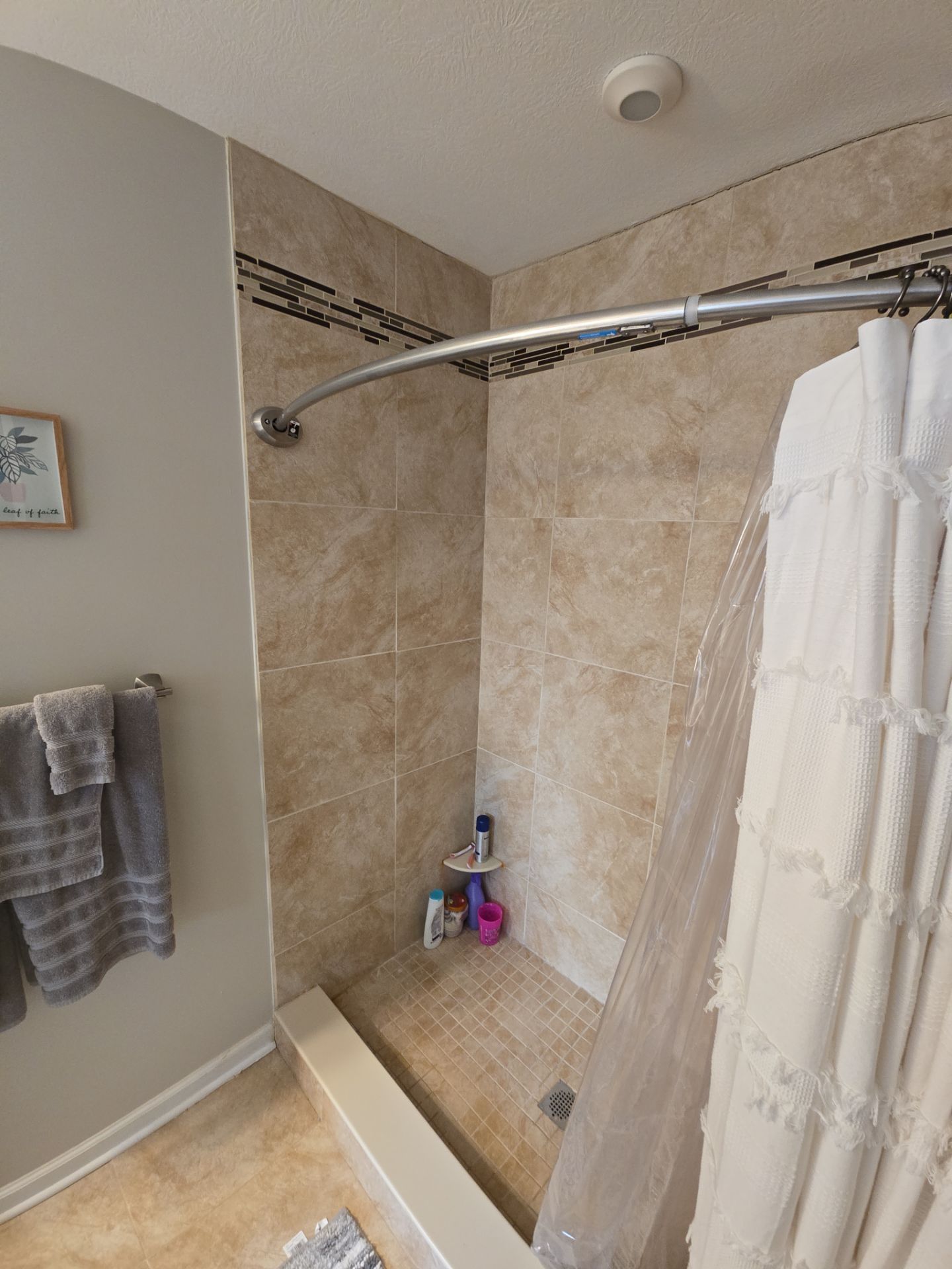 Custom Jacuzzi Walk-In Shower Remodel with Stone-Look Tile in Traverse City by Rainbow Seamless Systems