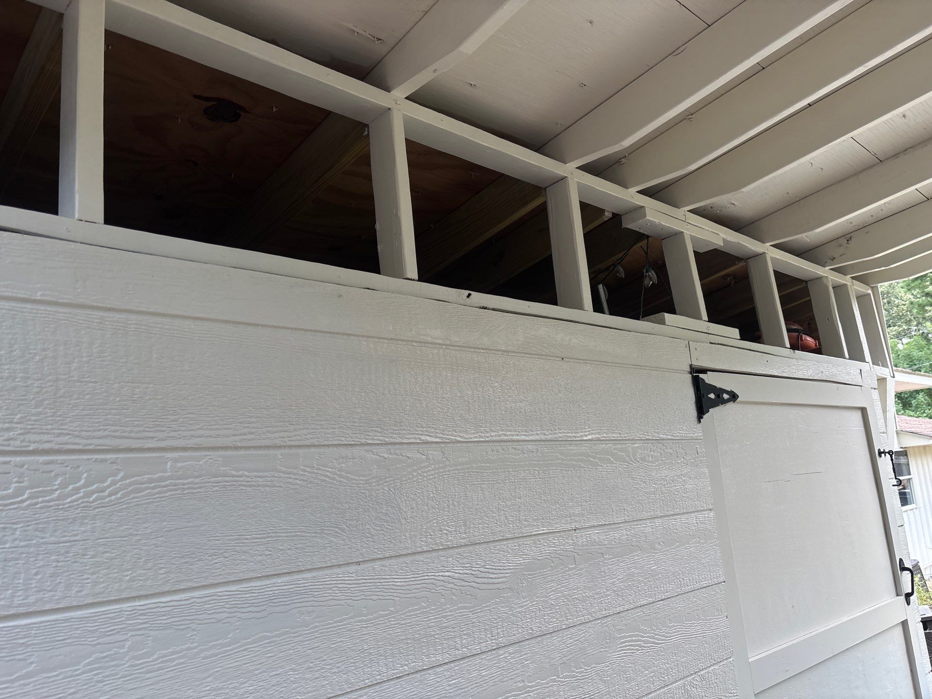 Exterior Painting in Flint, TX | White Brick Home & Metal Building with Sherwin-Williams Duration by Quality Coats Painting