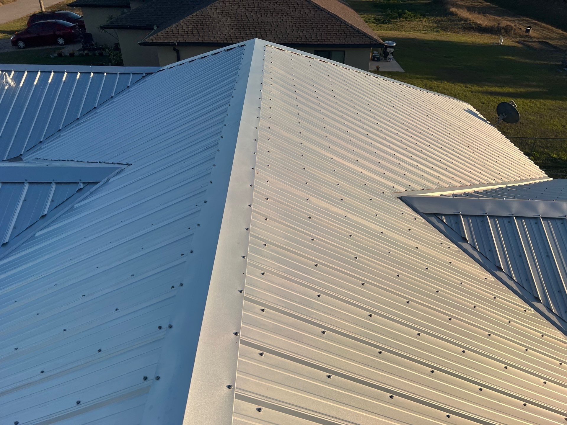 Residential Roofing Installation using Durabull Classic Rib Panel by Durabilis Roofing INC