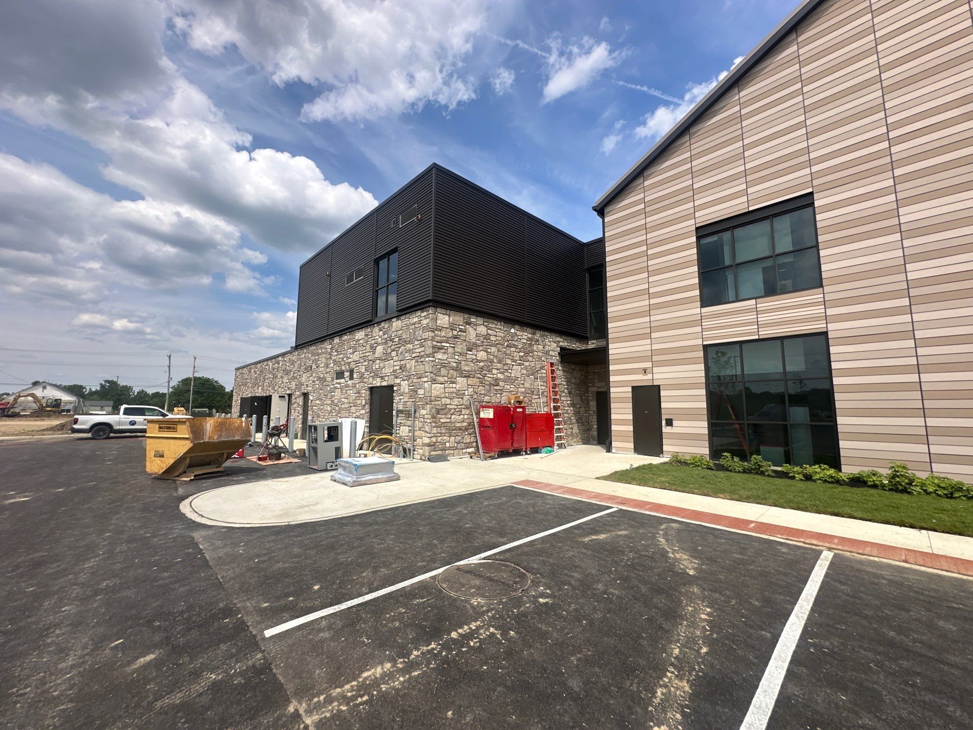 Commercial Siding  using James Hardie Lap siding by Nitro Roofing and Construction
