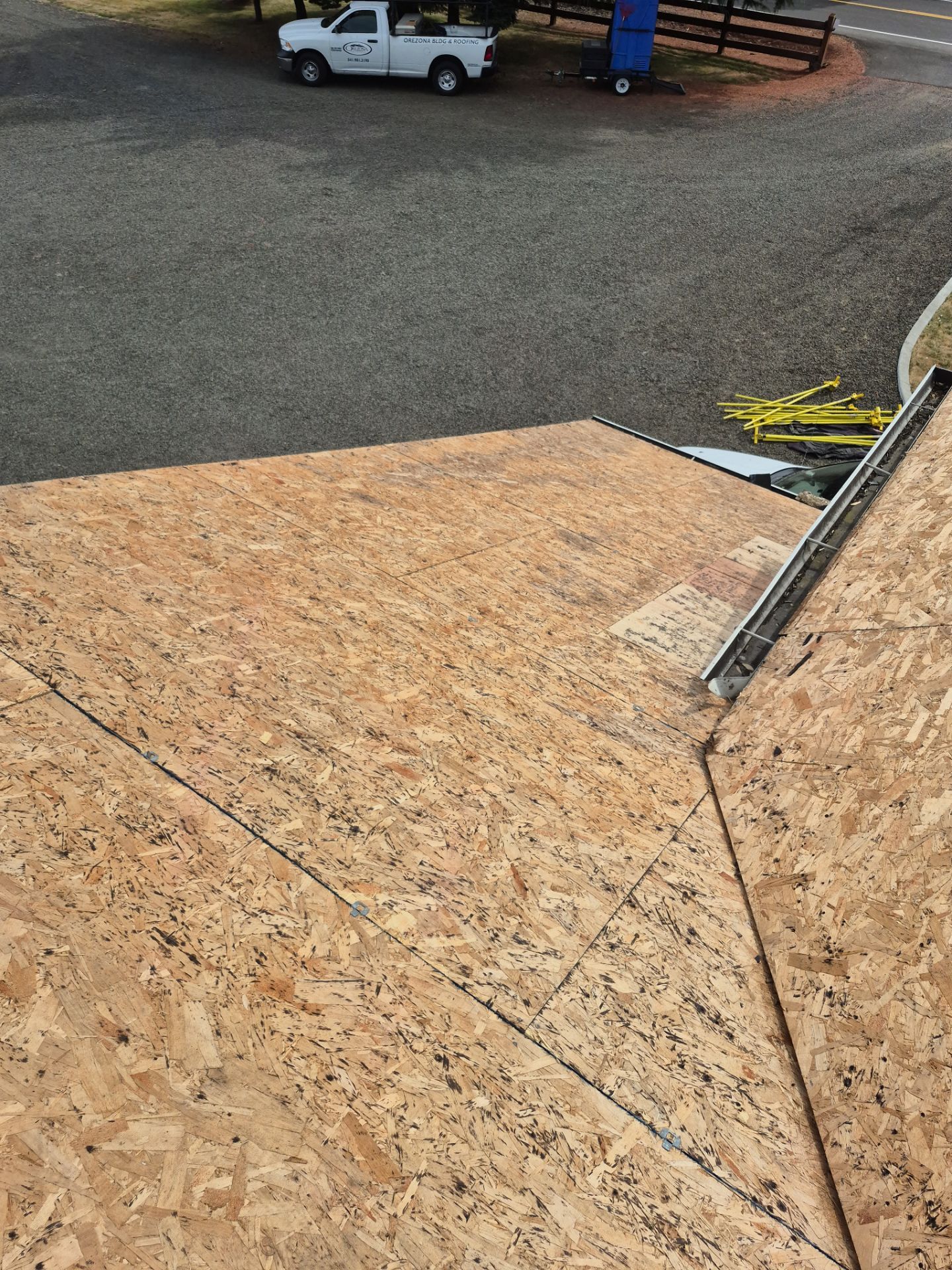 Residential Roof Replacement with Metal Accents by Orezona Building & Roofing Company, Inc.