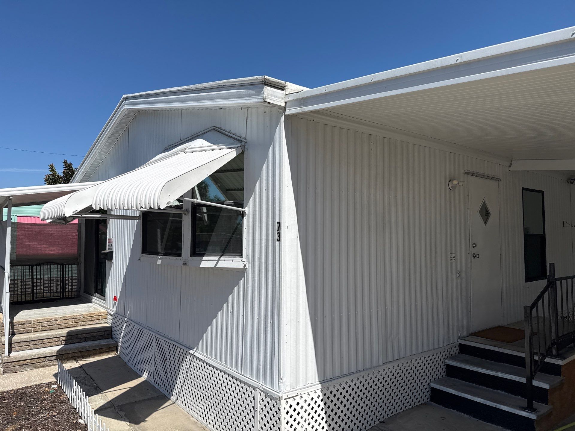 Mobile Home Soft Wash & TPO Roof Cleaning in Plaza Estates – Bradenton, FL by Sunshine AquaWash