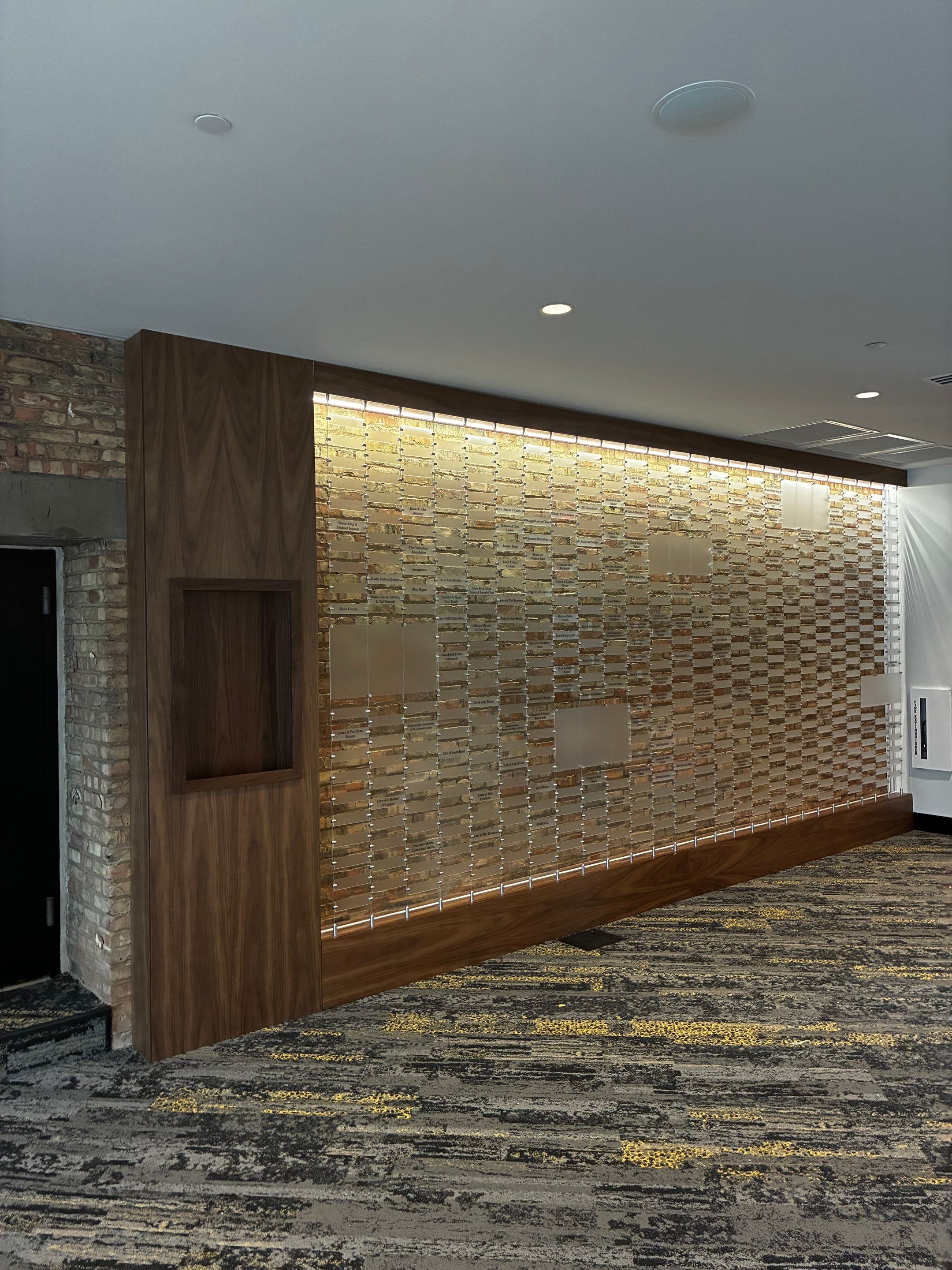 Custom Donor Recognition Walls and Wayfinding for Cultural Arts Center by Hayes Design co