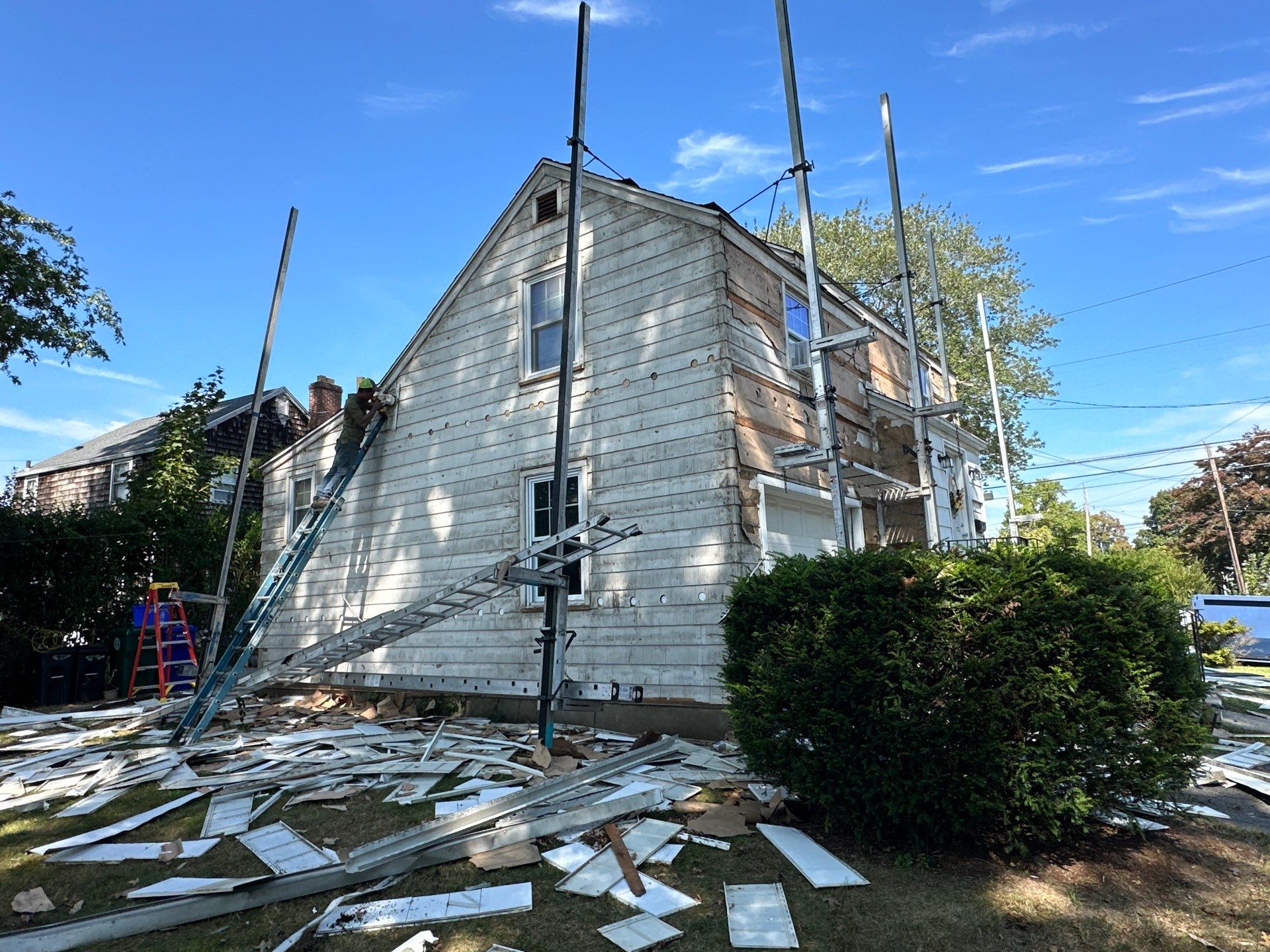 Siding Installation using CertainTeed Monogram Vinyl Siding - D4 - Forest by A Plus Exterior