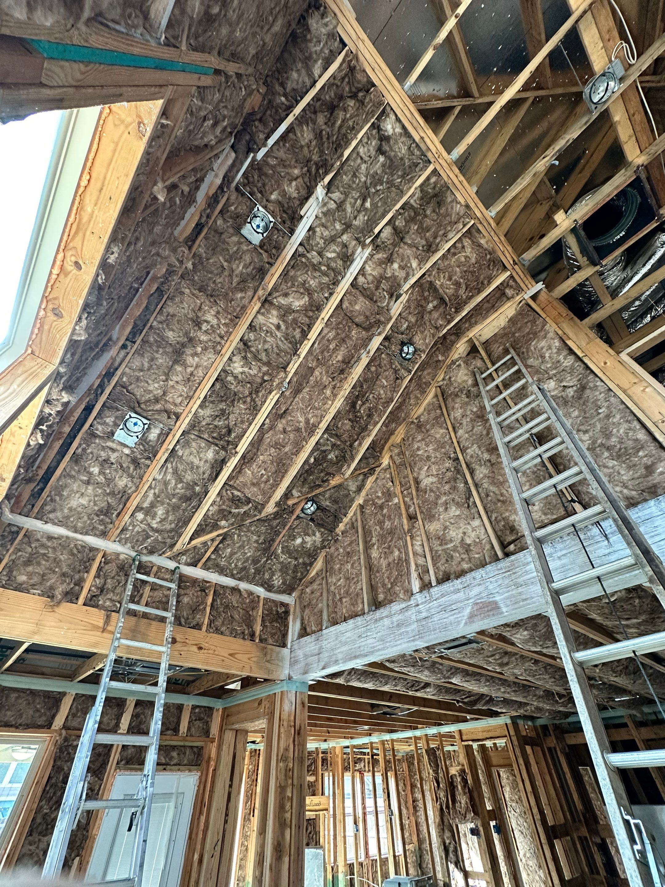 Fiberglass batt install on new construction home in Ft Worth by Apex Insulation Solutions