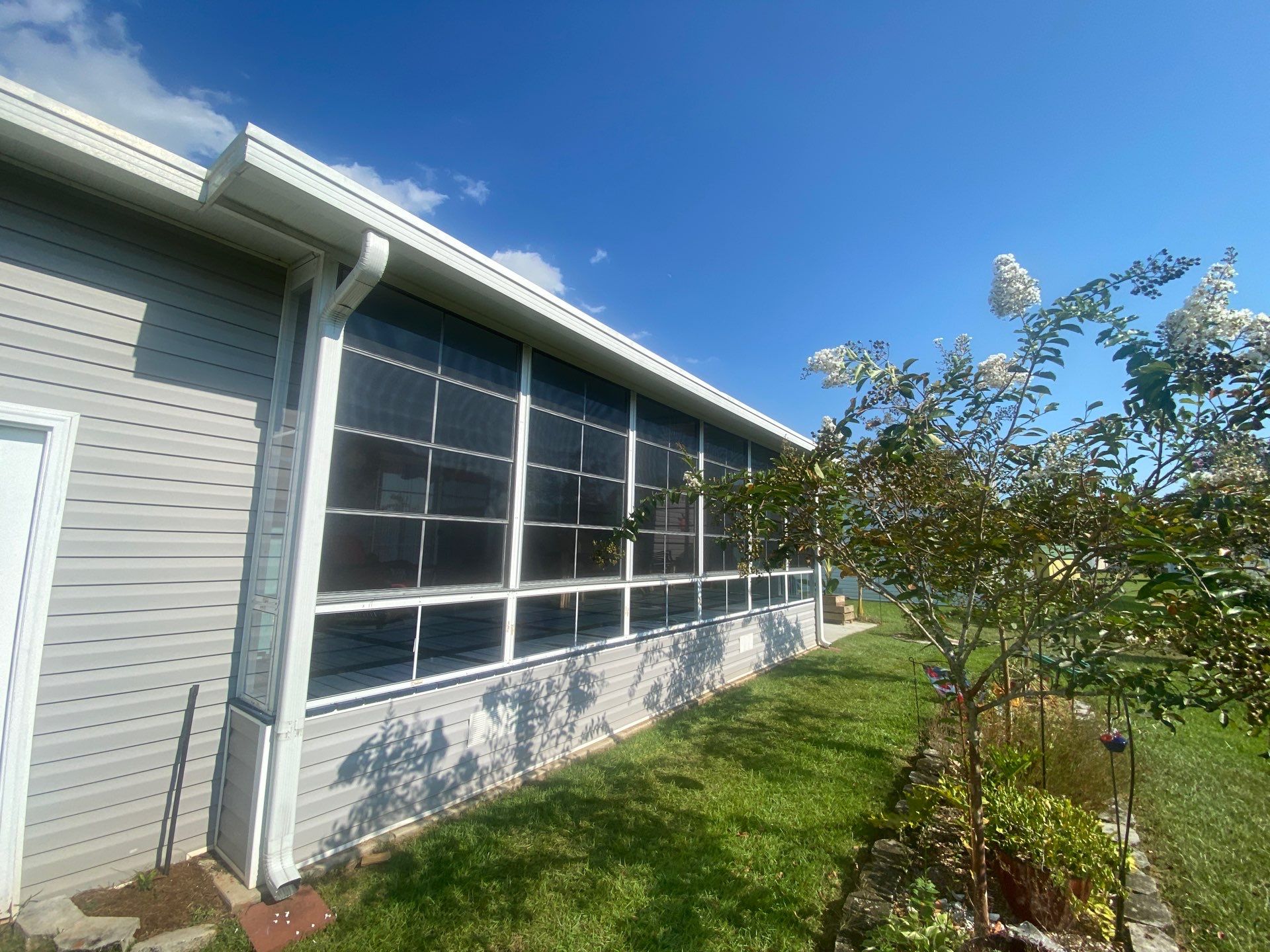 Screen Under w/Vinyl 4 Track Windows by Titan Sunrooms
