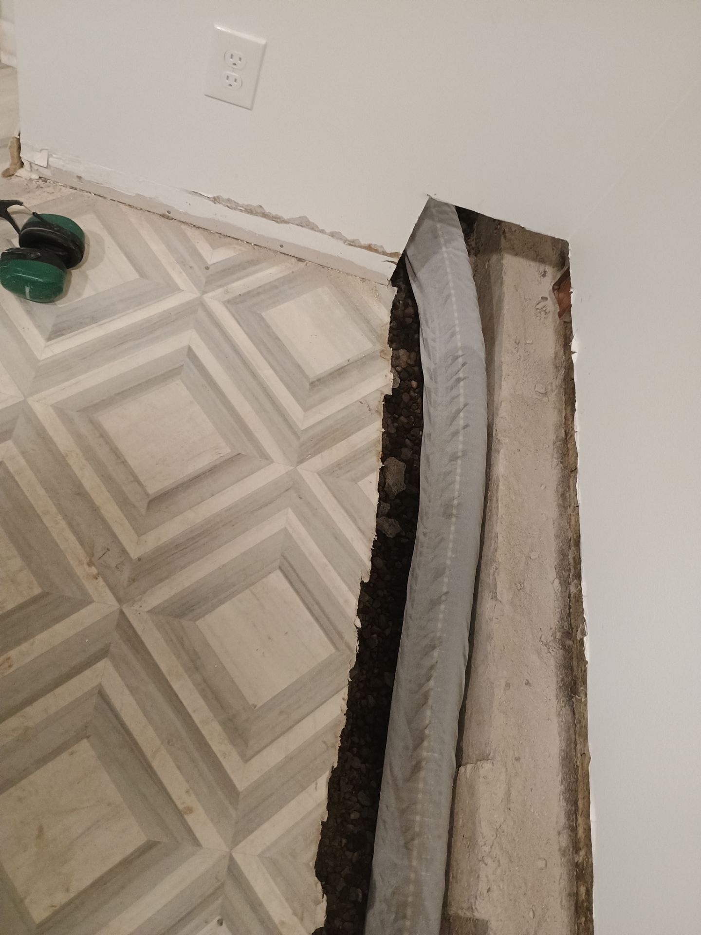 Interior Drain Tile & Buried Discharge in St. Anthony, MN by Waterproofing Northeast