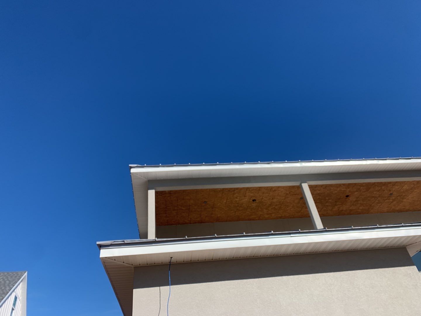 Soffit and Fascia Installation using White Vinyl Soffit in Pensacola FL by Gutter Professors