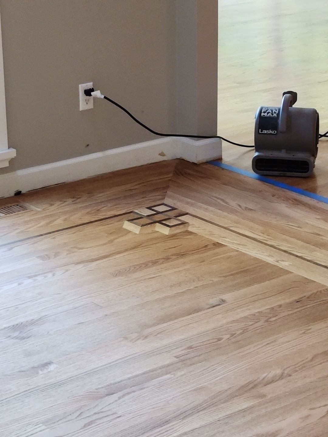 Ann Arbor Elegance: Red Oak and Walnut Living Room Masterpiece by Ann Arbor Hardwoods