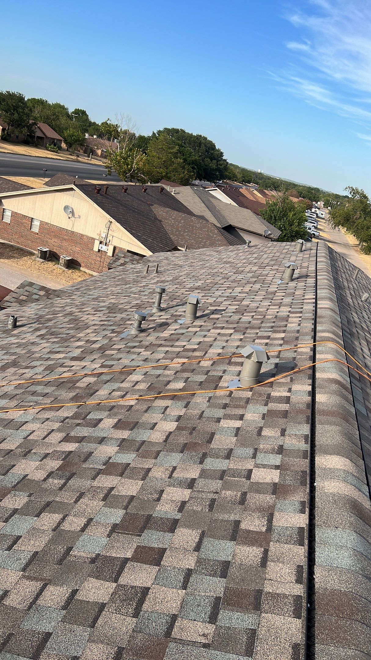 Commercial Roofing Installation using ATLAS Pinnacle Pristine Shingles by Harvey Roofing & Construction