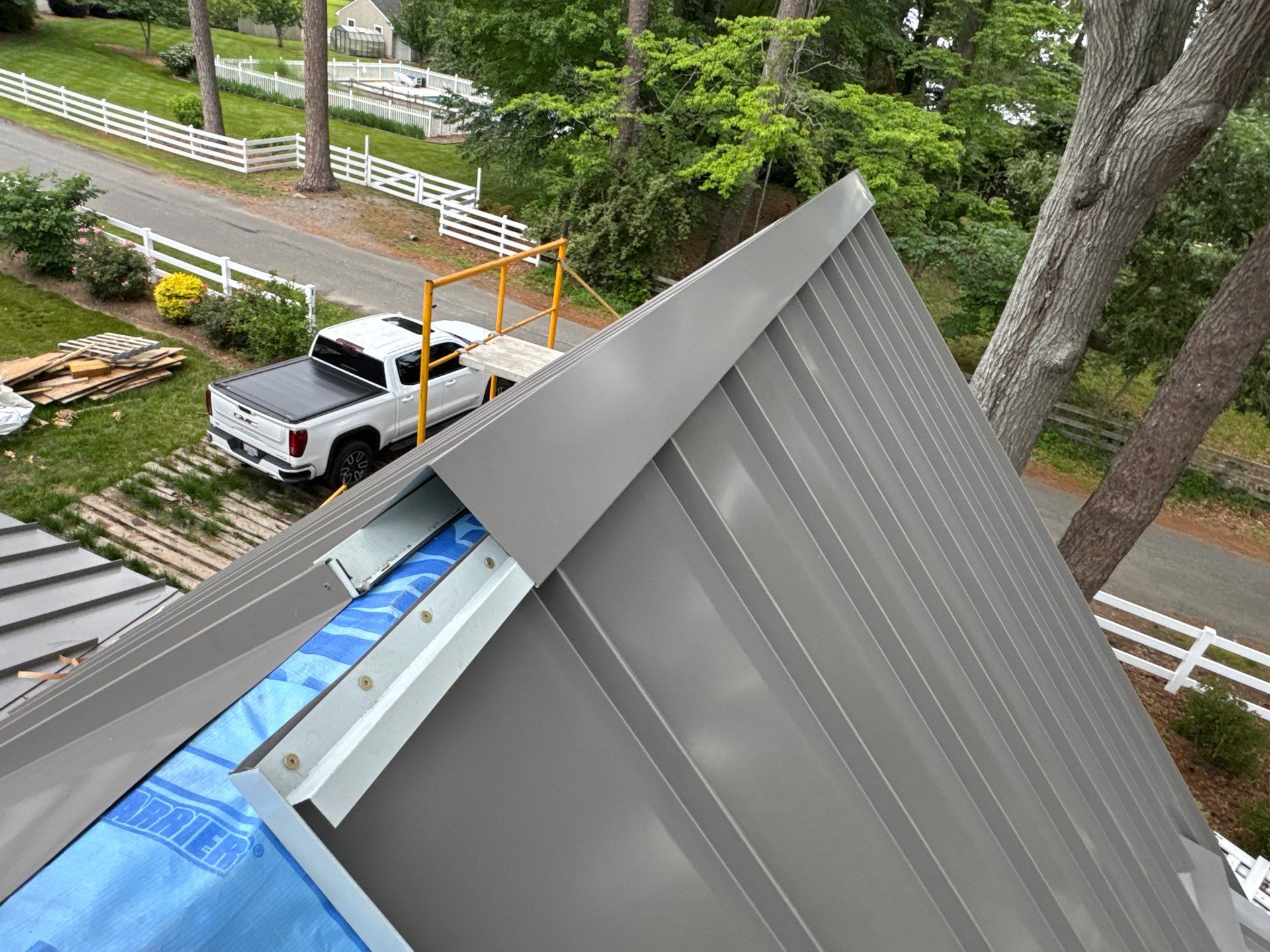 Custom New Construction Metal Roof Installation in Deltaville by Cade Construction