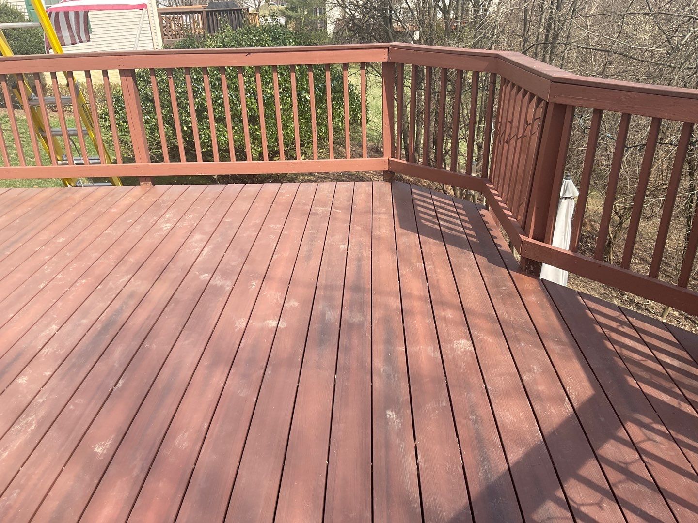 Deck Installation using New Composite Deck Board by Alpha Design Services