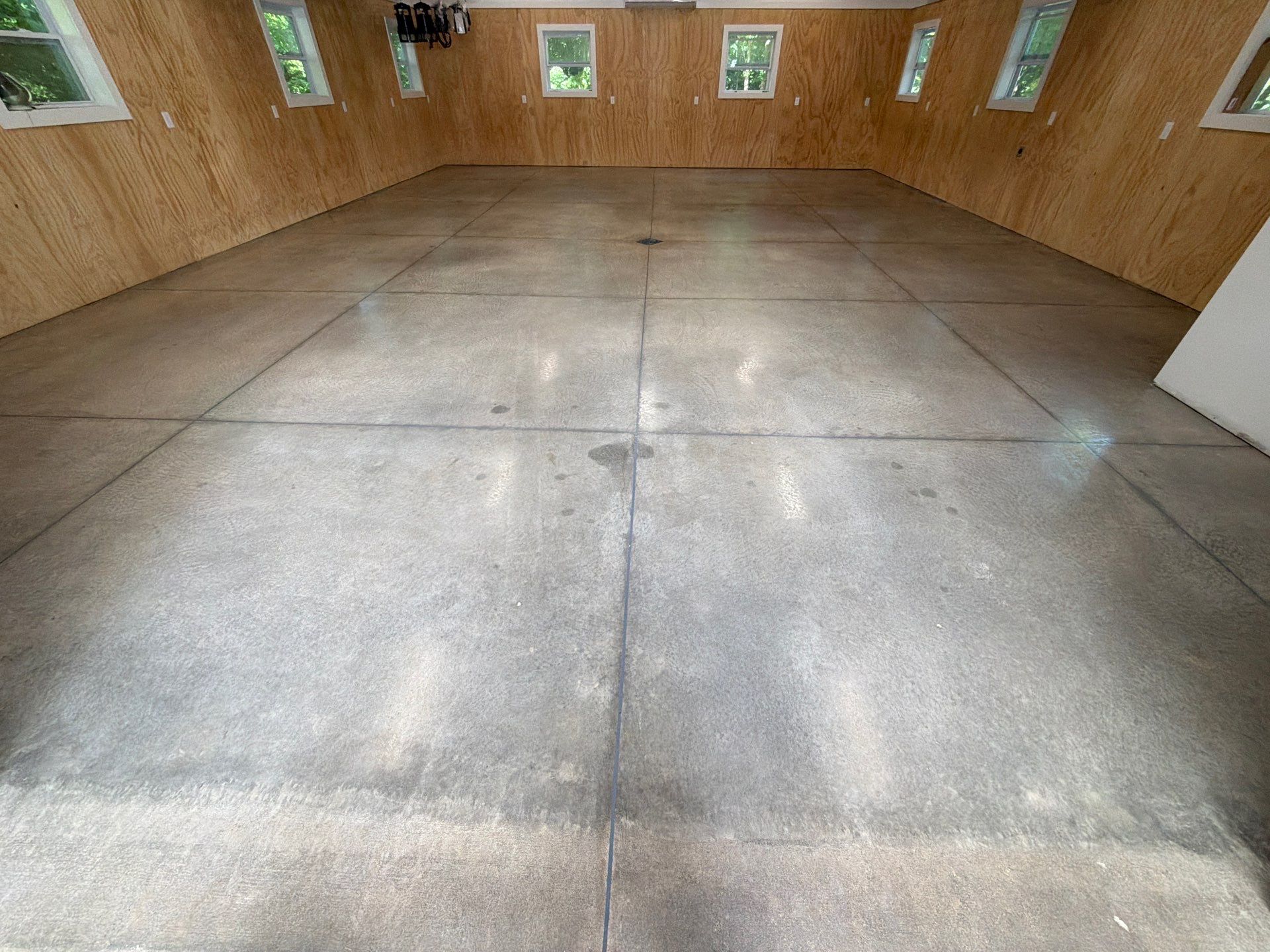 Garage Epoxy Floor Installation and Concrete Surface Polishing in Shelby by Gordon Painting