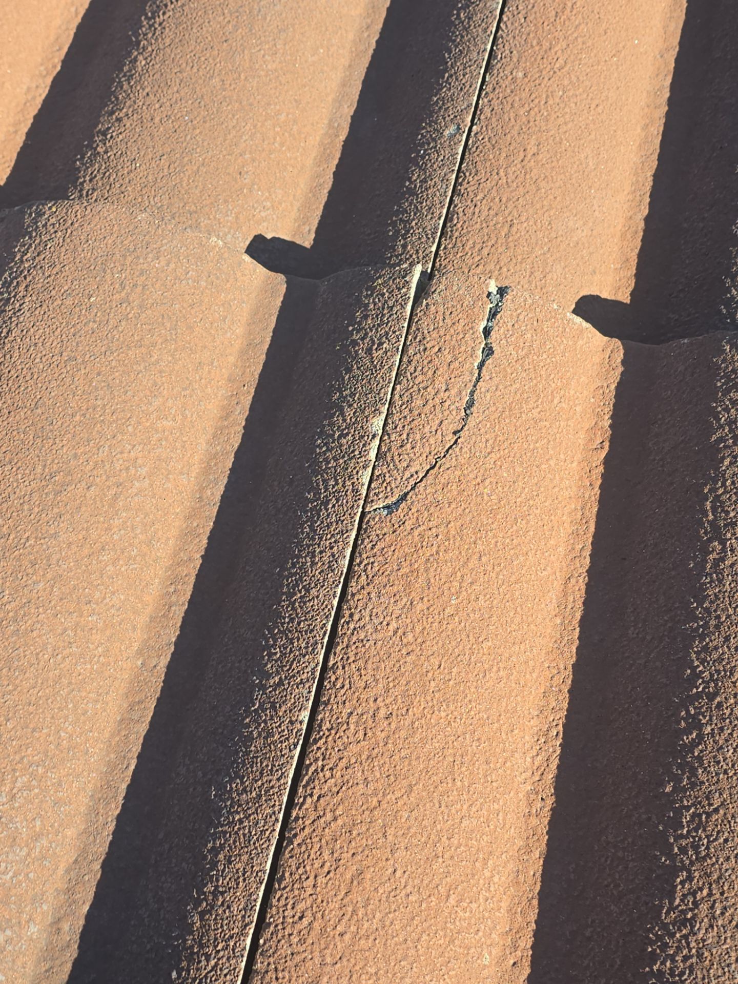 Tile Roof repair by Grandmark Service Company