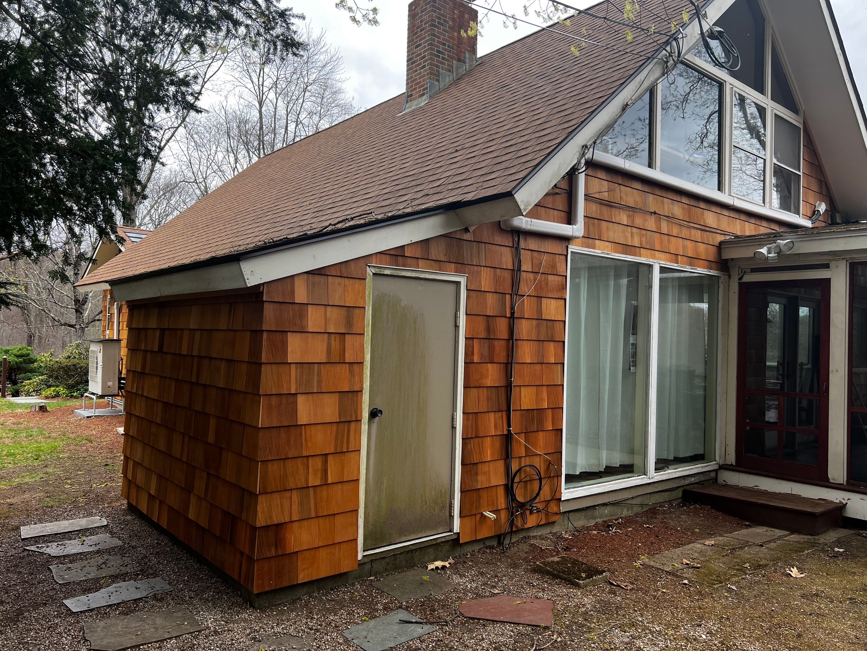 Siding Installation using Perfection Red Western Cedar Shingles  by Loyalty Exterior Solutions 