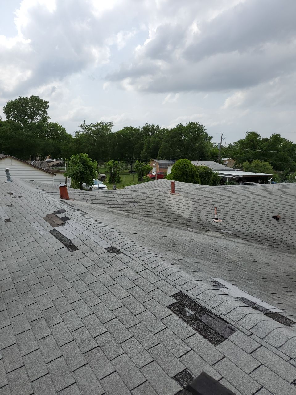 Residential Roofing Installation using Roofing Shingles by Harvey Roofing & Construction