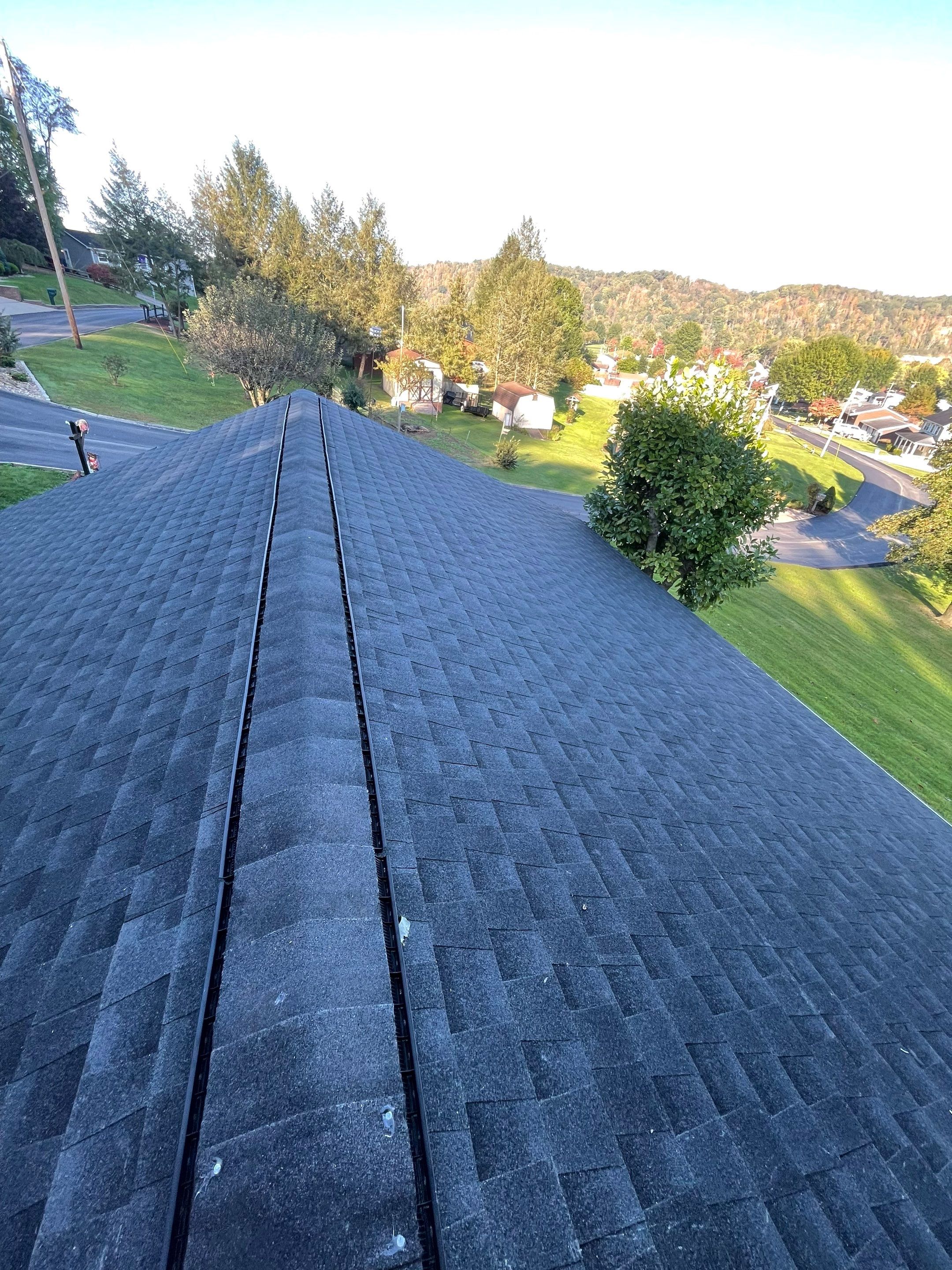 Residential Roofing Installation using GAF Timberline HDZ, Black by Rainstoppers Roofing