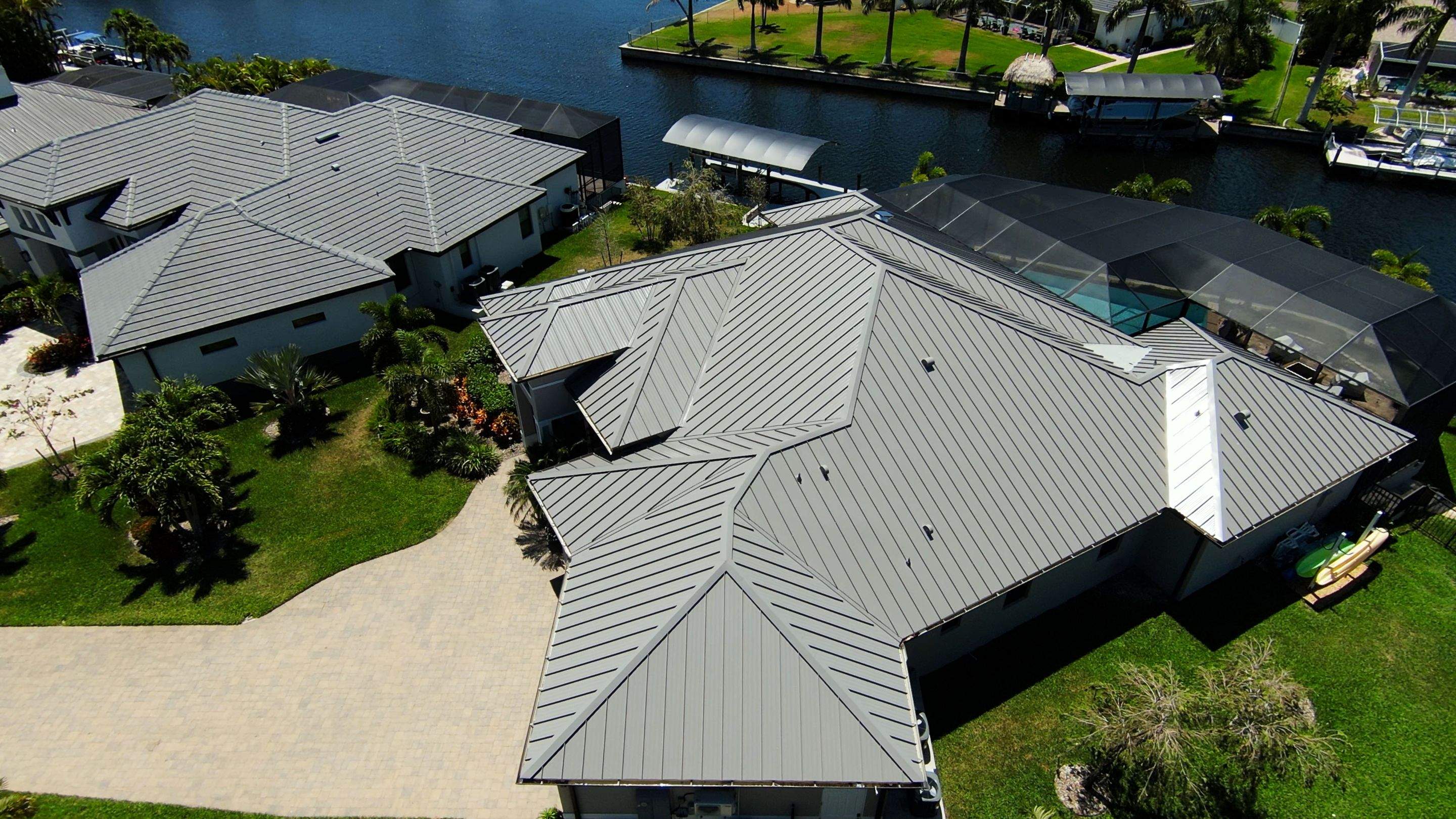 Residential Roofing Installation using Gulf Coast Metals Gulf Seam Panels by Four Peaks Roofing