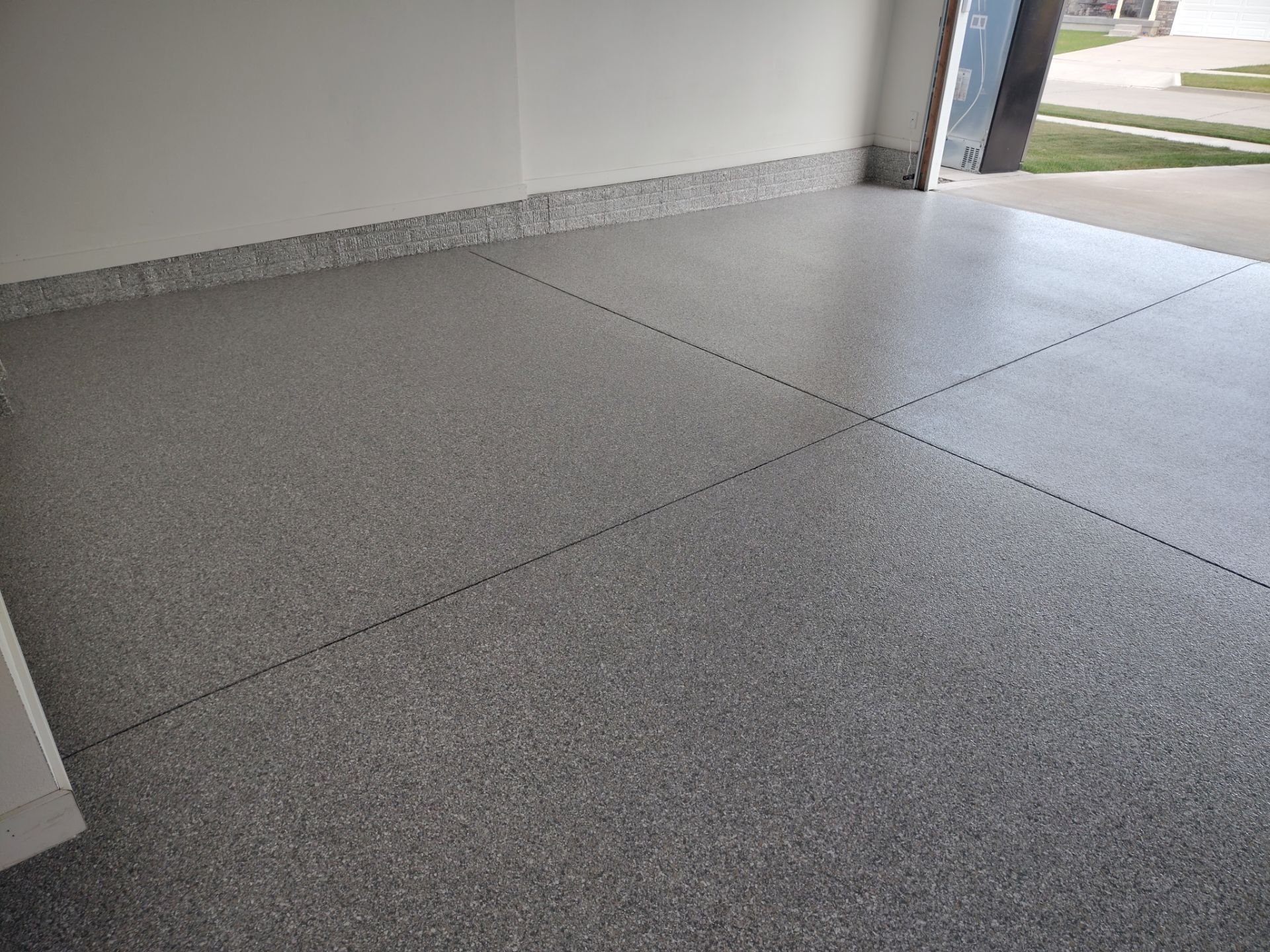 Polyaspartic Garage Floor Coating in Waukee, Iowa by Revival Concrete Coatings
