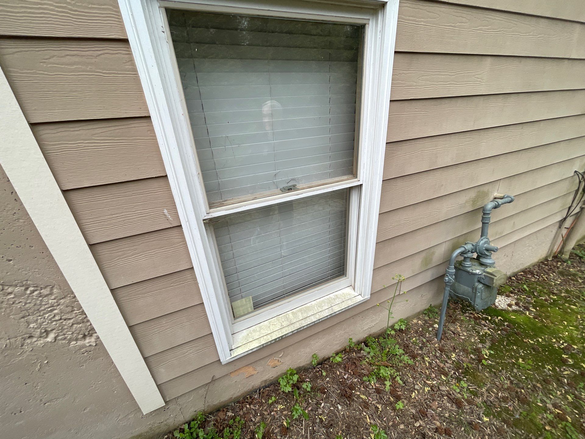 Exterior Painting using Sherwin-Williams and Rotted Wood Replacement by Nelson Exteriors 