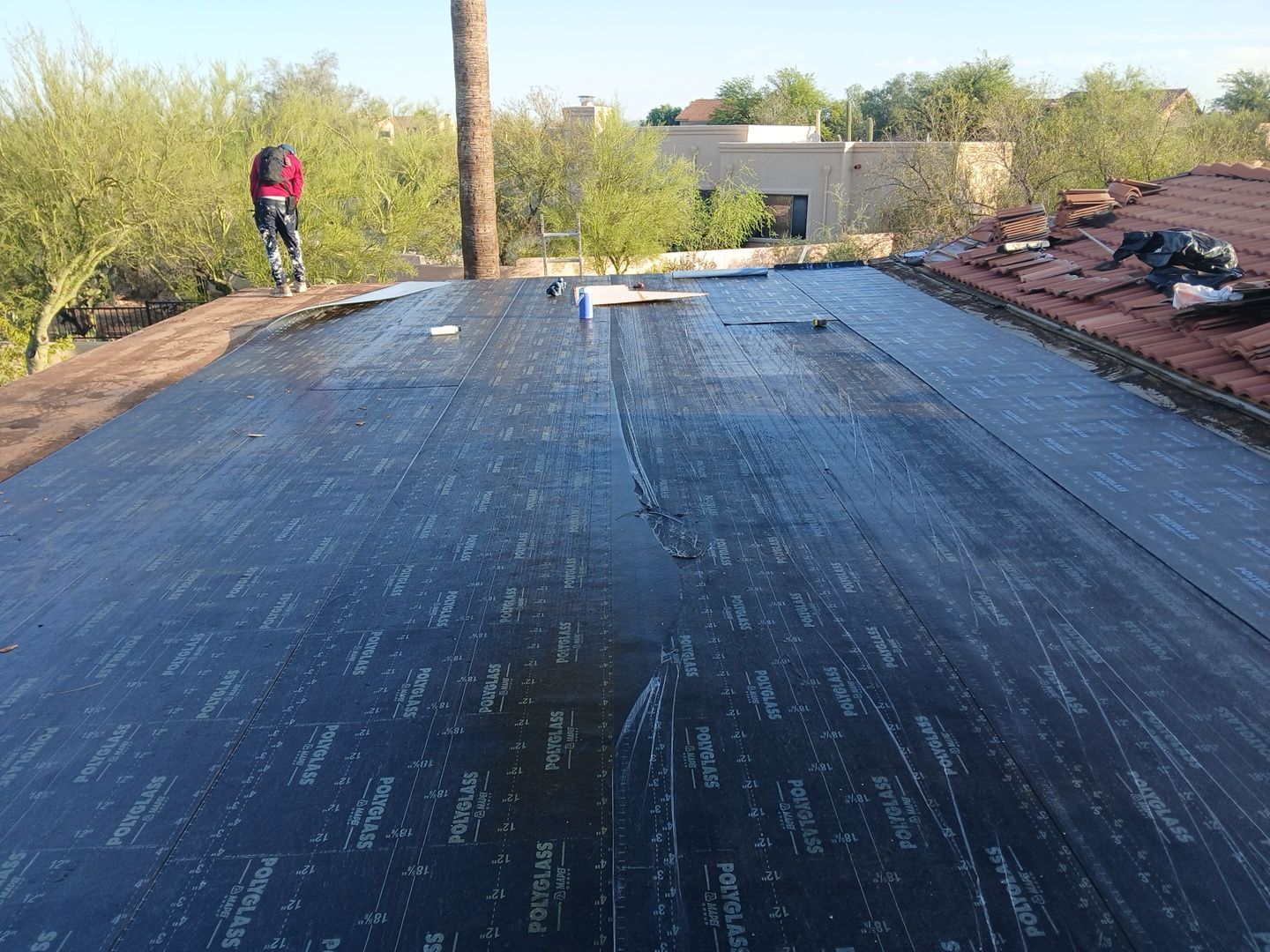Residential Tile Roof Restoration and Low Slope Membrane Replacement in Tucson by West Coast Roofing AZ
