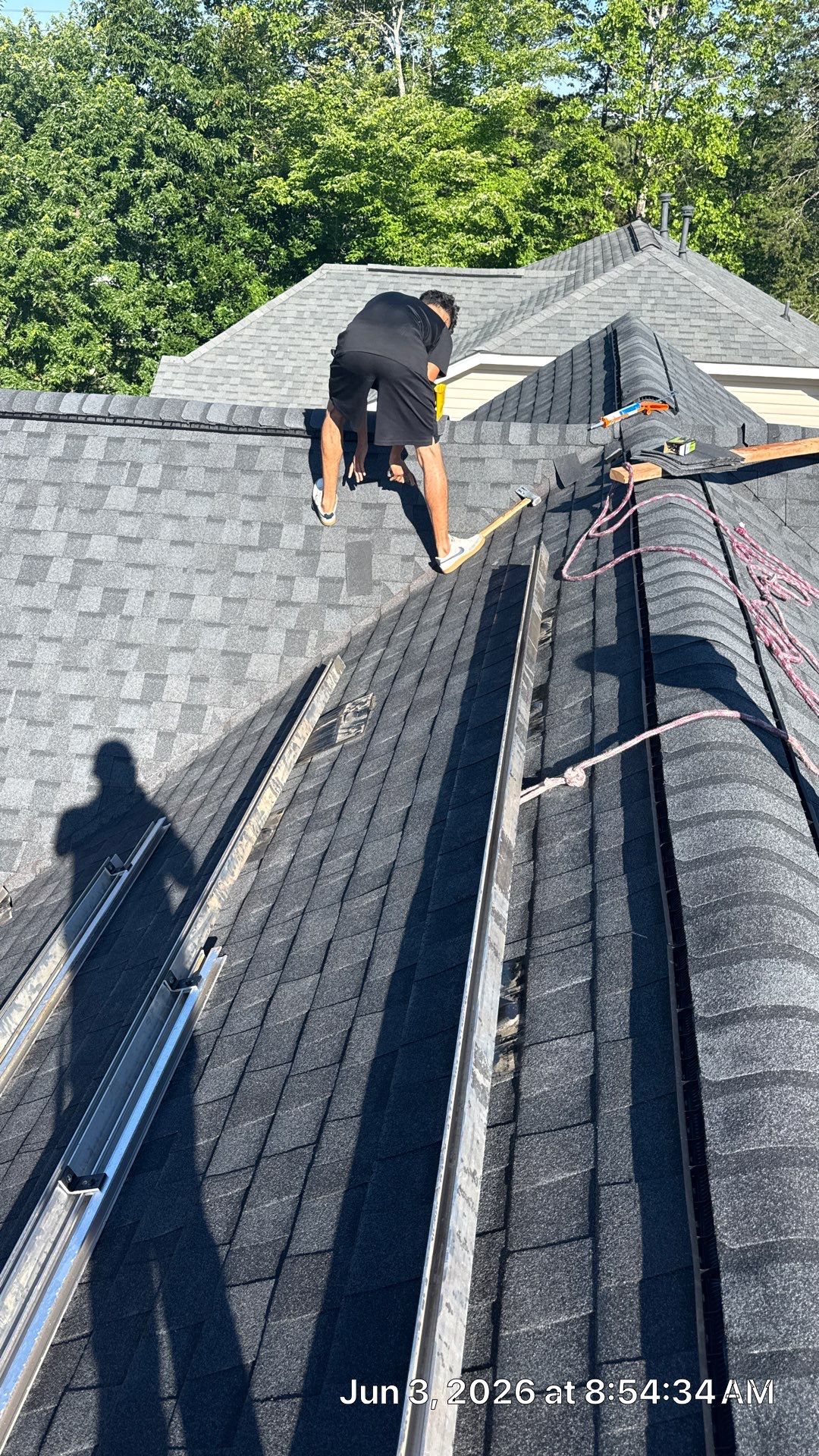 Roof and downspout replacement by hail and wind damage by Just Brilliant Restoration JBR