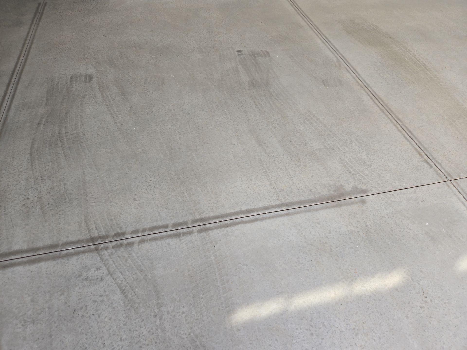 High-Gloss Epoxy Flake Garage Floor Coating in Brandon by Select Painting, Coatings & Garage Cabinets