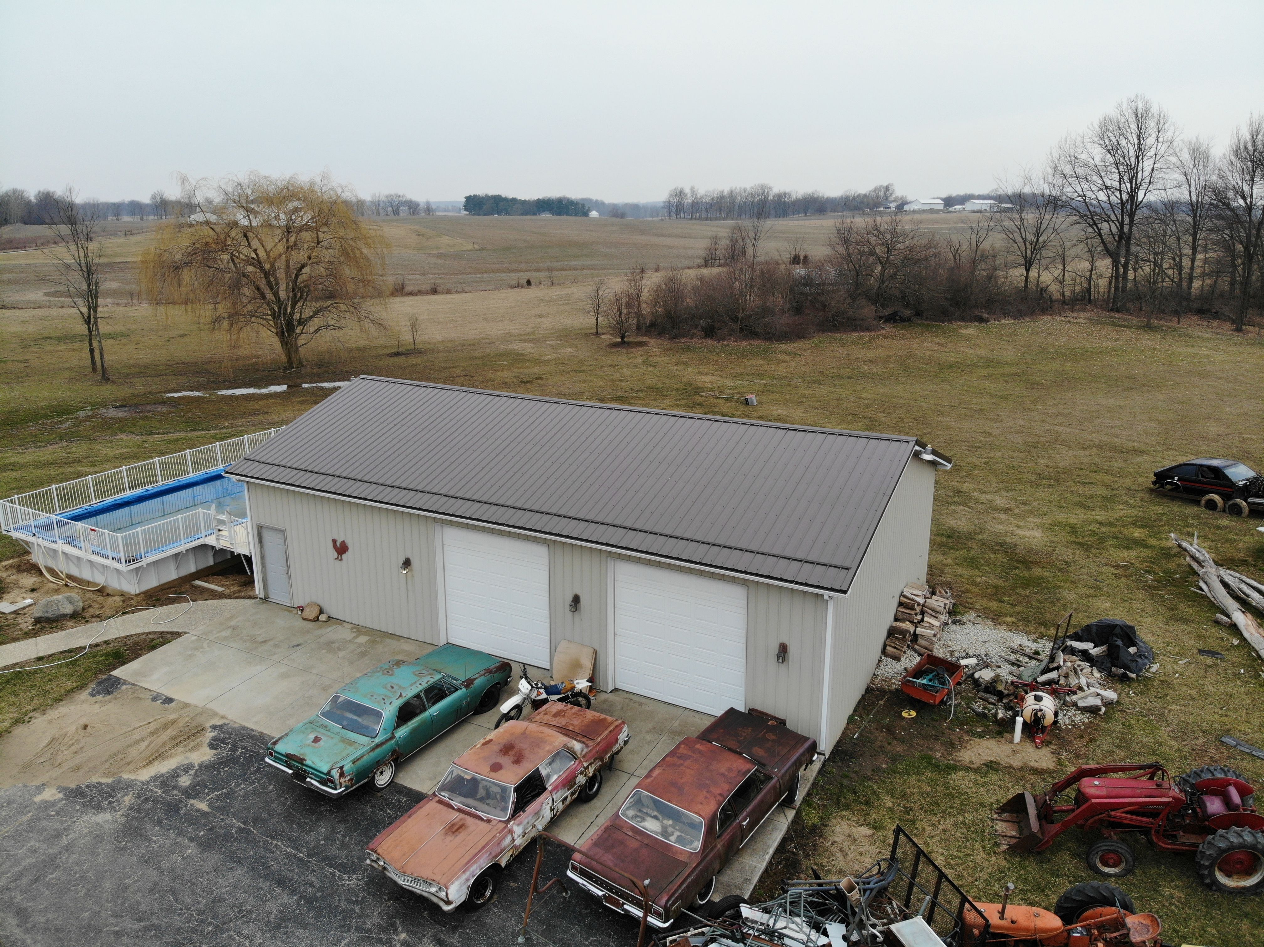 Exposed Fastener Metal Roof on Multi-Home Property in Columbia City, Indiana by 4Ever Metal Roofing