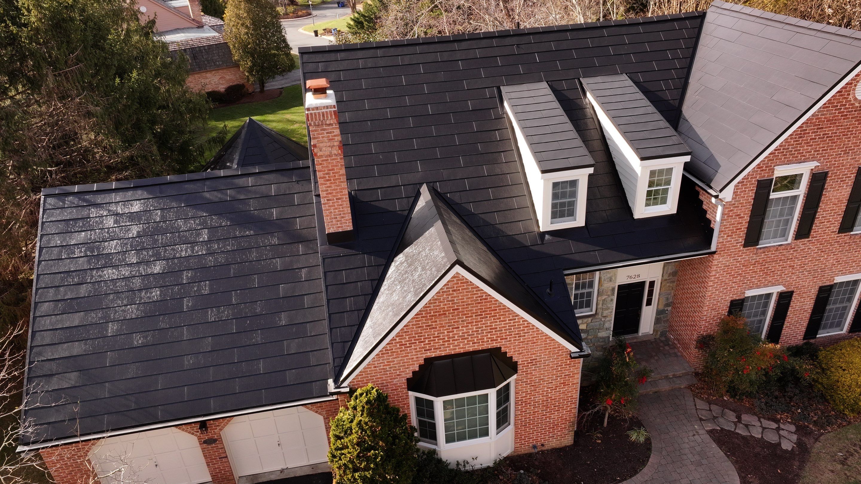 Sleek Tesla Solar Roof Installation by American Home Contractors