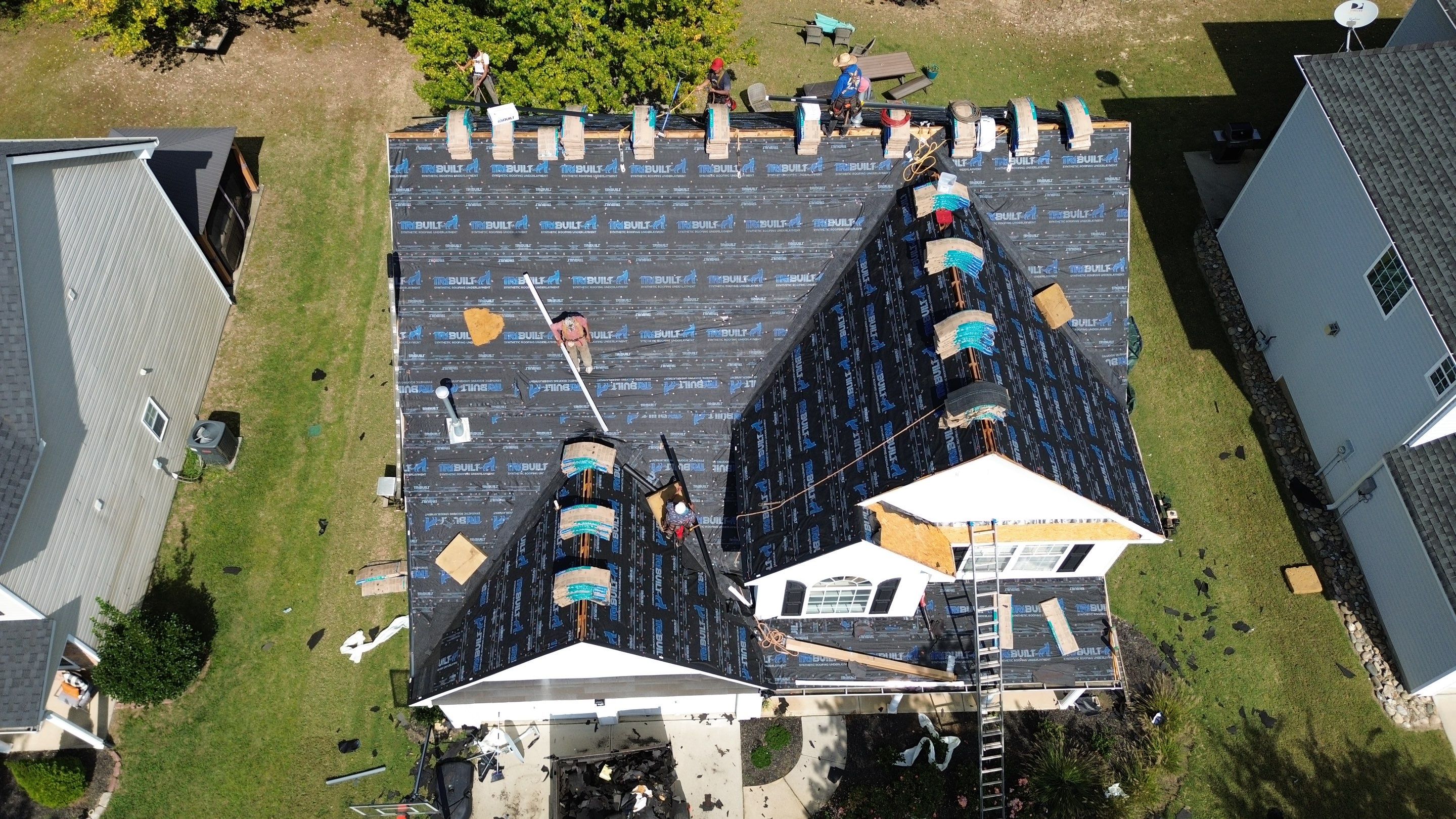 Roof and downspout replacement by hail damage by Just Brilliant Restoration JBR