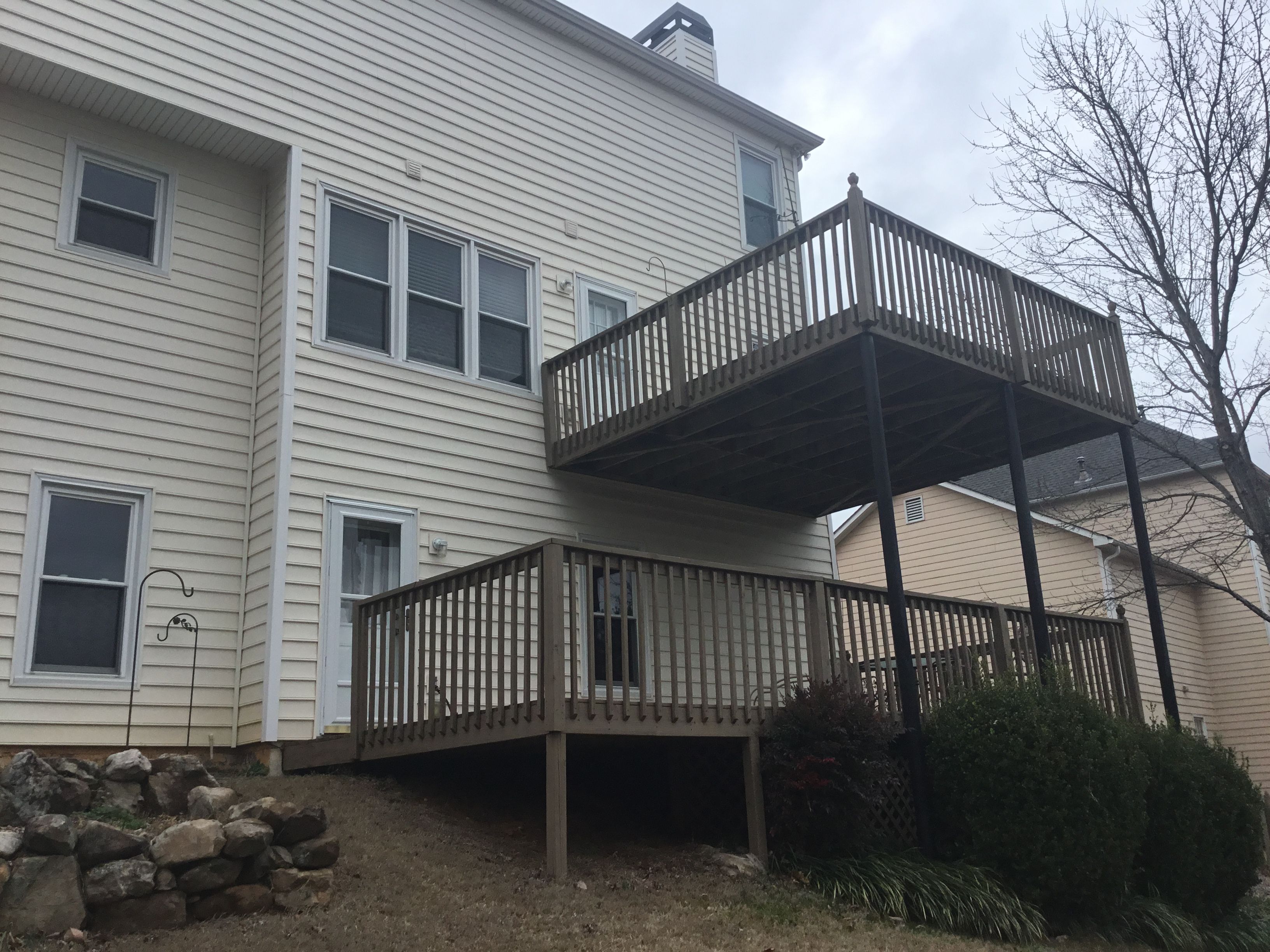 Two-Story Pressure Treated Wood Deck and Porch Addition in Marietta by Swift Home Renovations