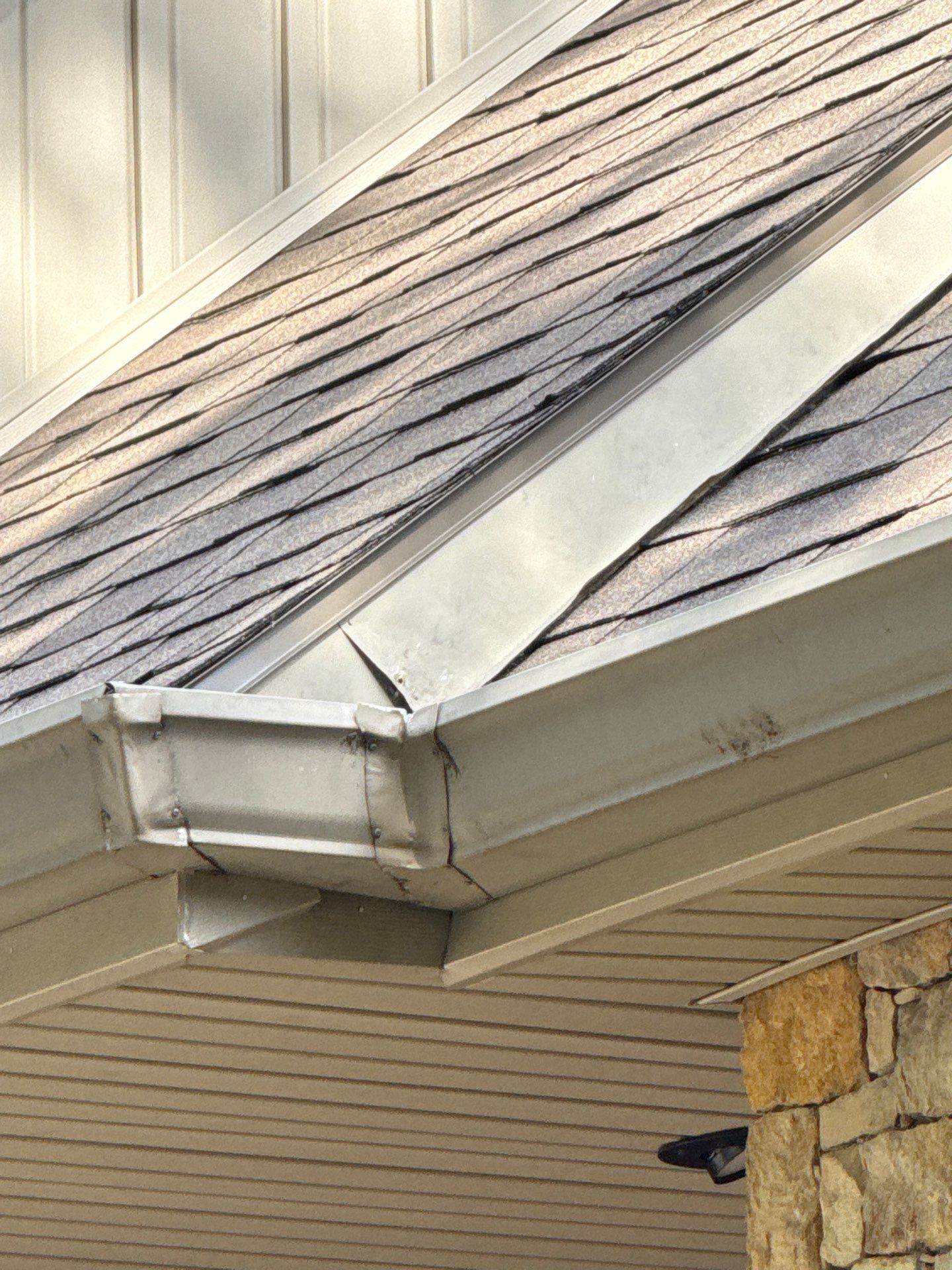 Comprehensive Kansas City Exterior Remodel Featuring Board And Batten Siding by EEC Windows, Siding & Roofing