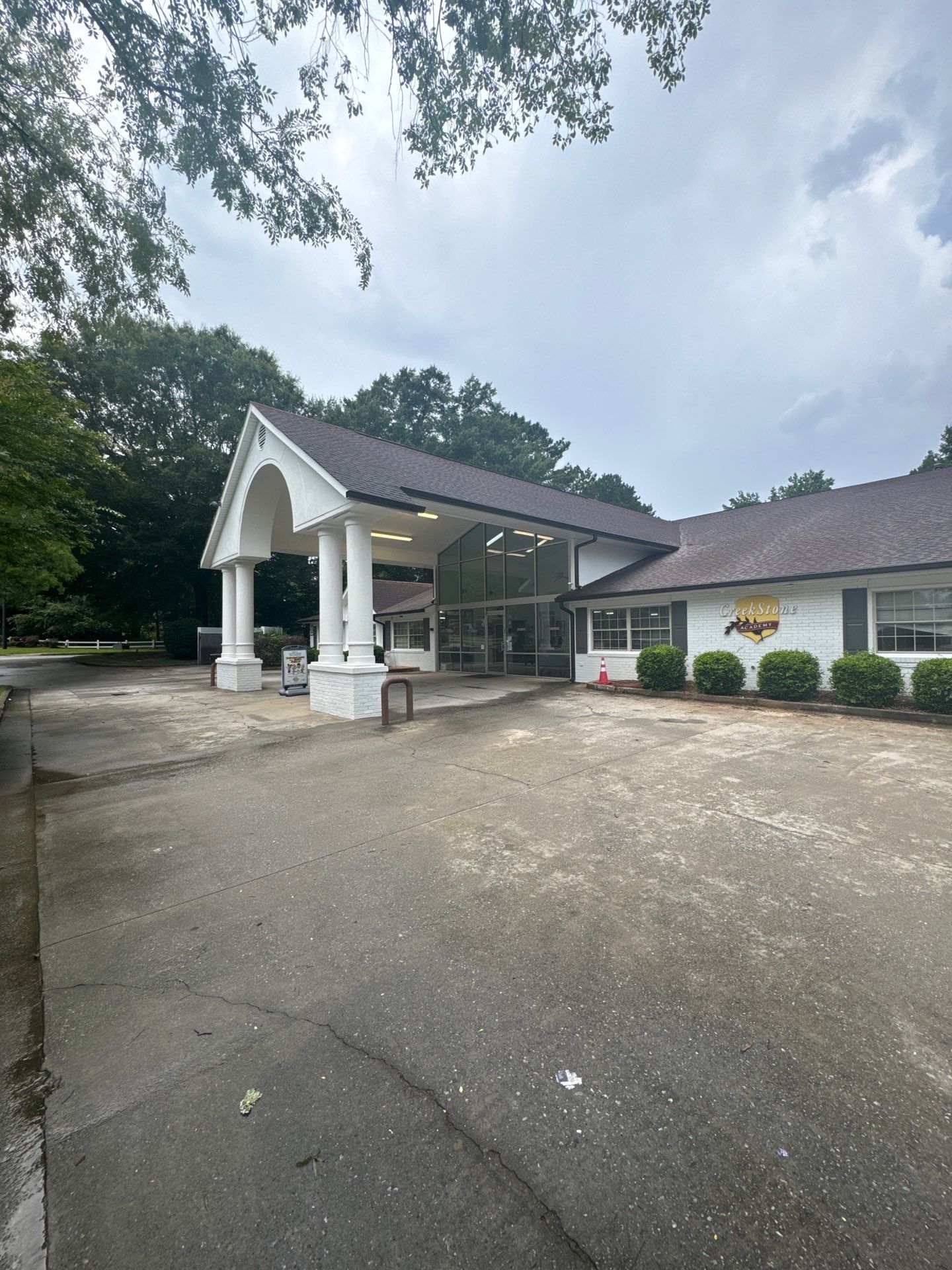 Commercial Exterior Brick and Stucco Painting in Fayetteville by Swift Home Renovations
