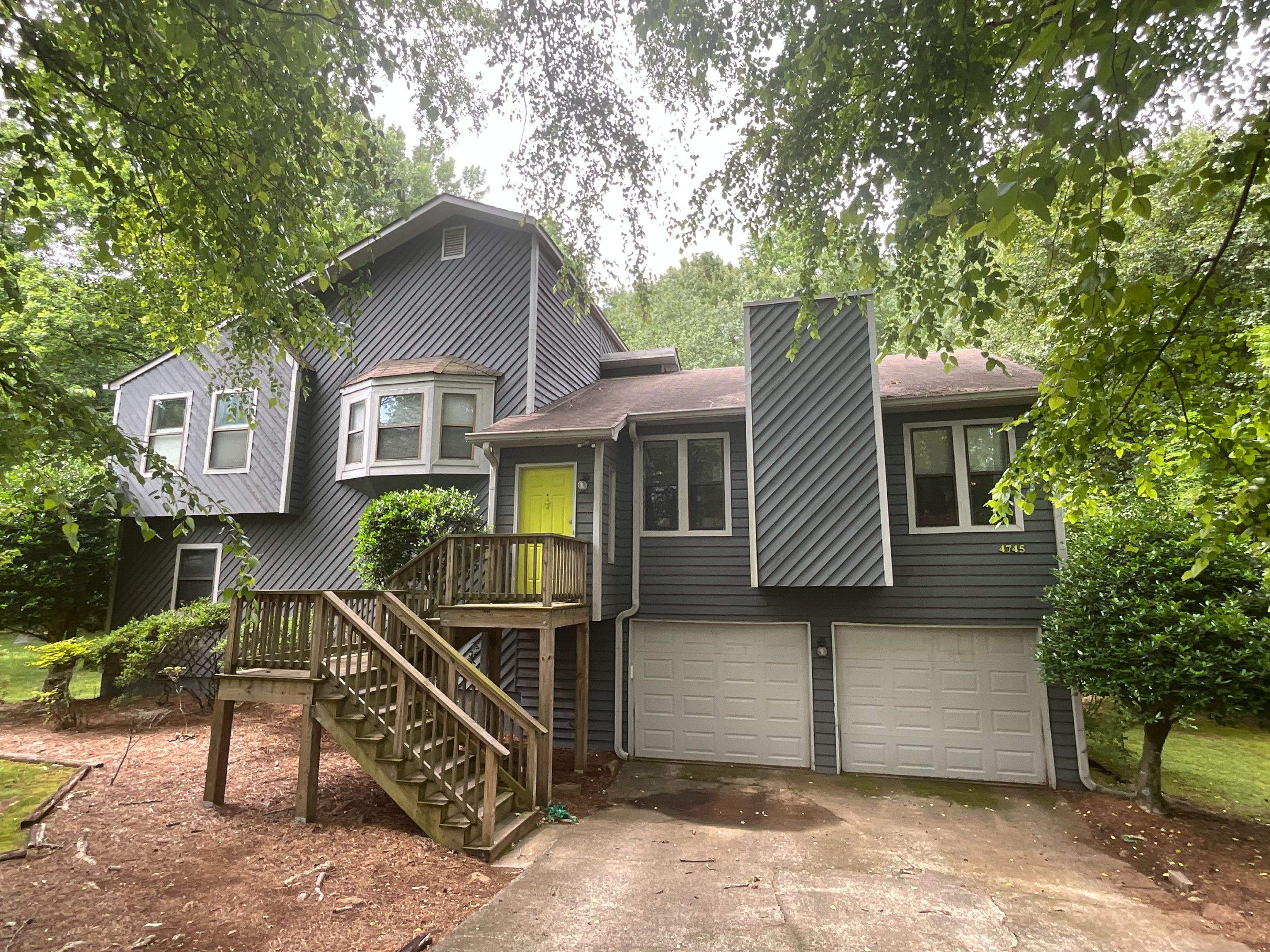 Dark Grey Exterior Painting and Front Door Refresh in Marietta by Swift Home Renovations