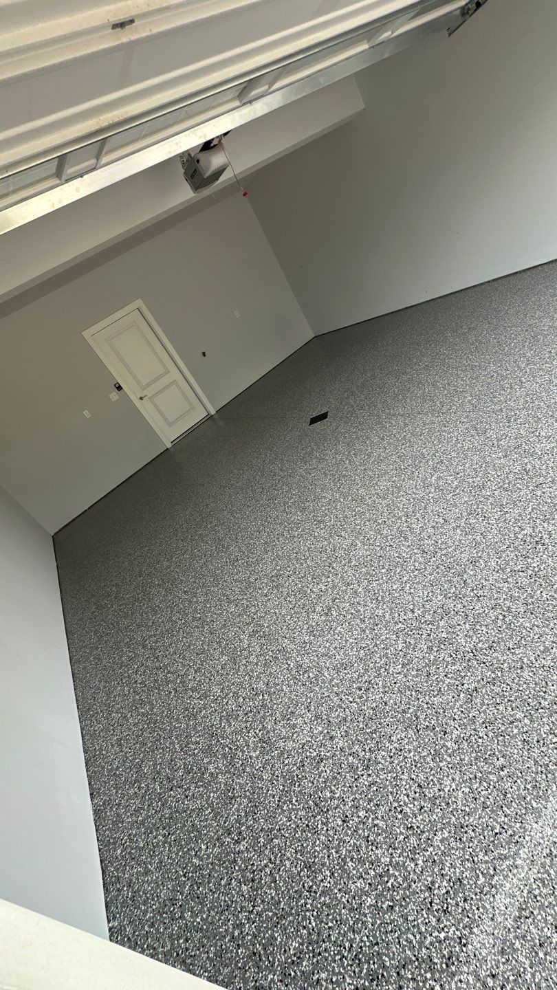 Porch + Garage Project in Evans City by Floors in a Day, Inc