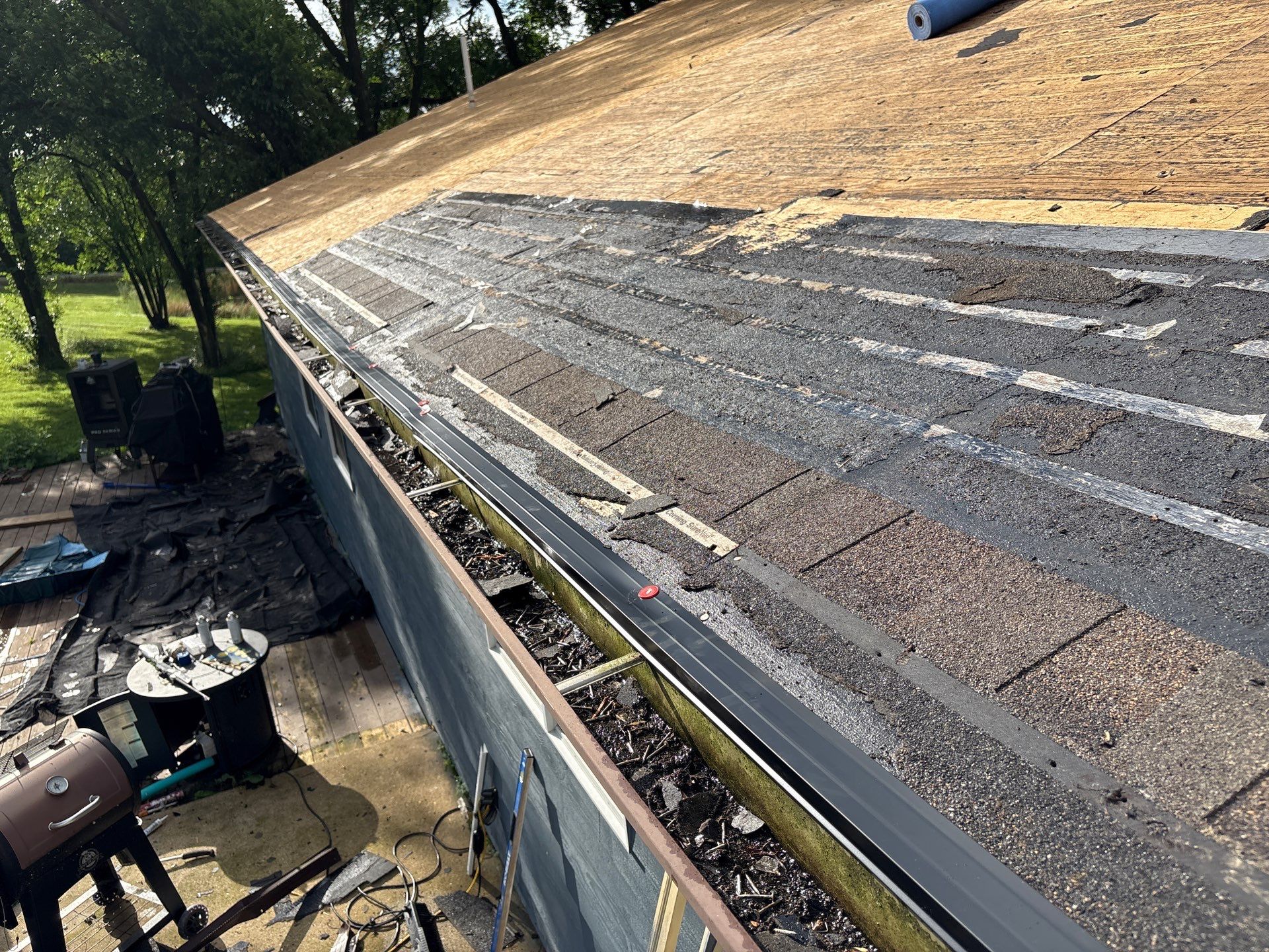 Residential Roof + Gutters & Downspouts Install  by Titan Commercial & Residential Roofing 