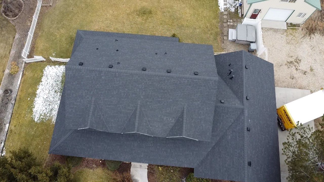 Big Style in Mission Pointe – New Roof with DecoRidge & Onyx Black Finish by ID Roofing LLC