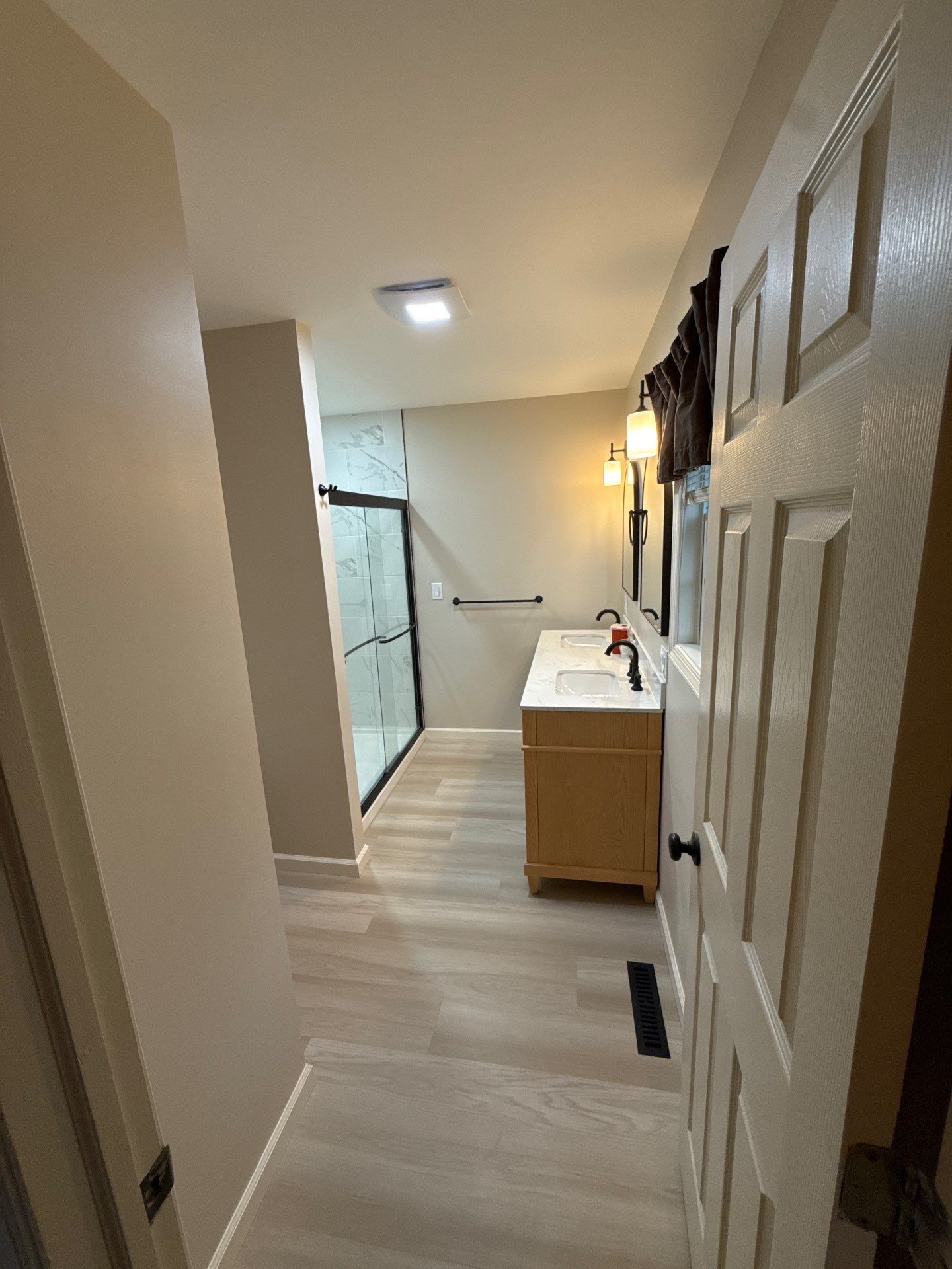 Bathroom and Powder Room Remodel by For Him Contracting