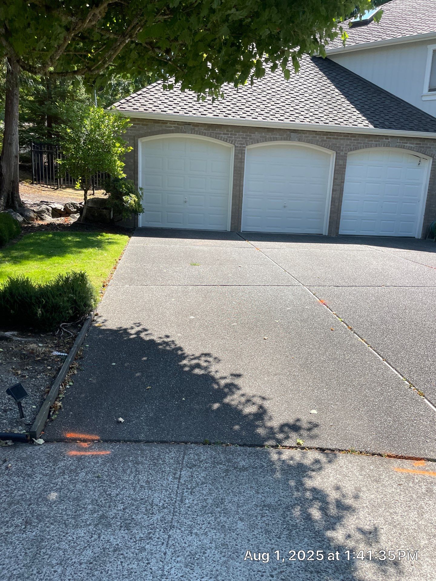 Multi-color Stamped & Sealed Concrete Driveway Renovation | Mukilteo by Jireh Asphalt & Concrete Inc