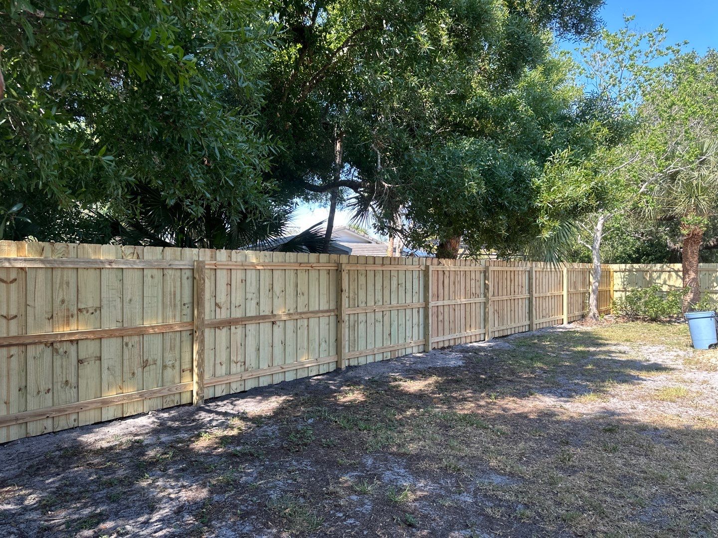 Wood Fence Installation using Wood Board on Board Fence by Asap fence and gates, LLC