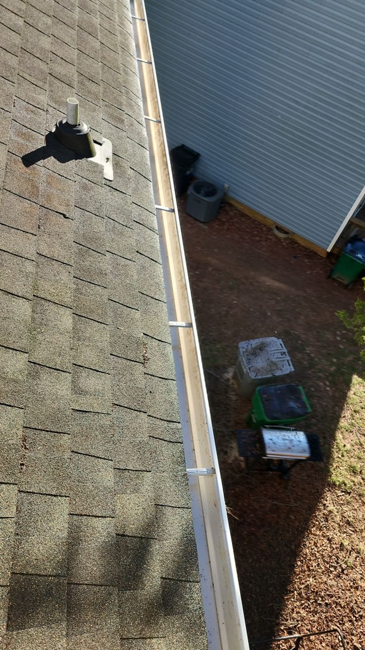 Gutter Cleaning using water by Power Wash Masters LLC