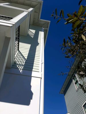 Gutter Installation Using White 6 Inch Seamless Gutters