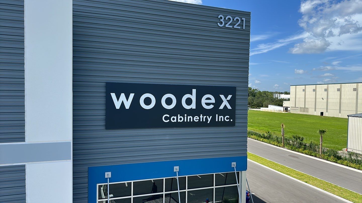 Acrylic Letters on Aluminum Backer for Woodex Cabinetry by SignCrafters