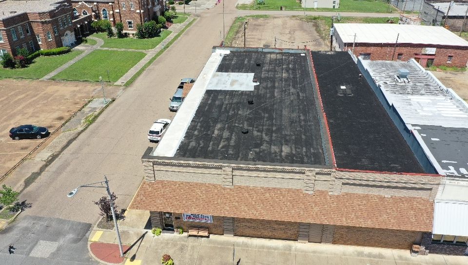Commercial Roofing Installation using Aldocoat Coatings by Hostetler Roofing