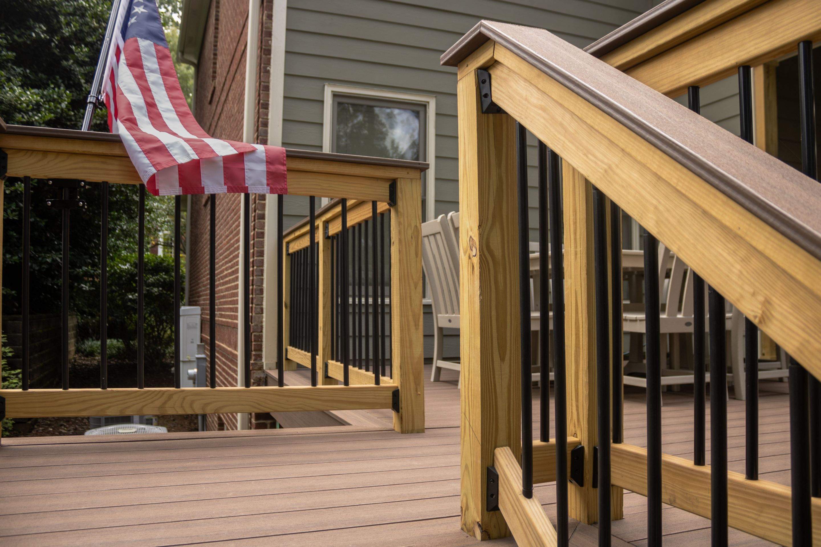 Tucker, GA Covered Porch Build and Deck Replacement using Deckorators Voyage Series Decking by Nelson Exteriors 