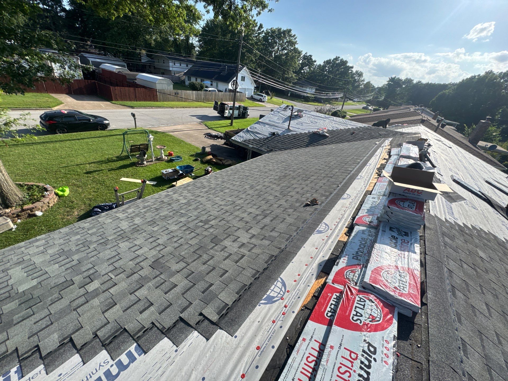 Residential Roof + Gutters & Downspouts & Gutter Guards Replacement  by Titan Commercial & Residential Roofing 