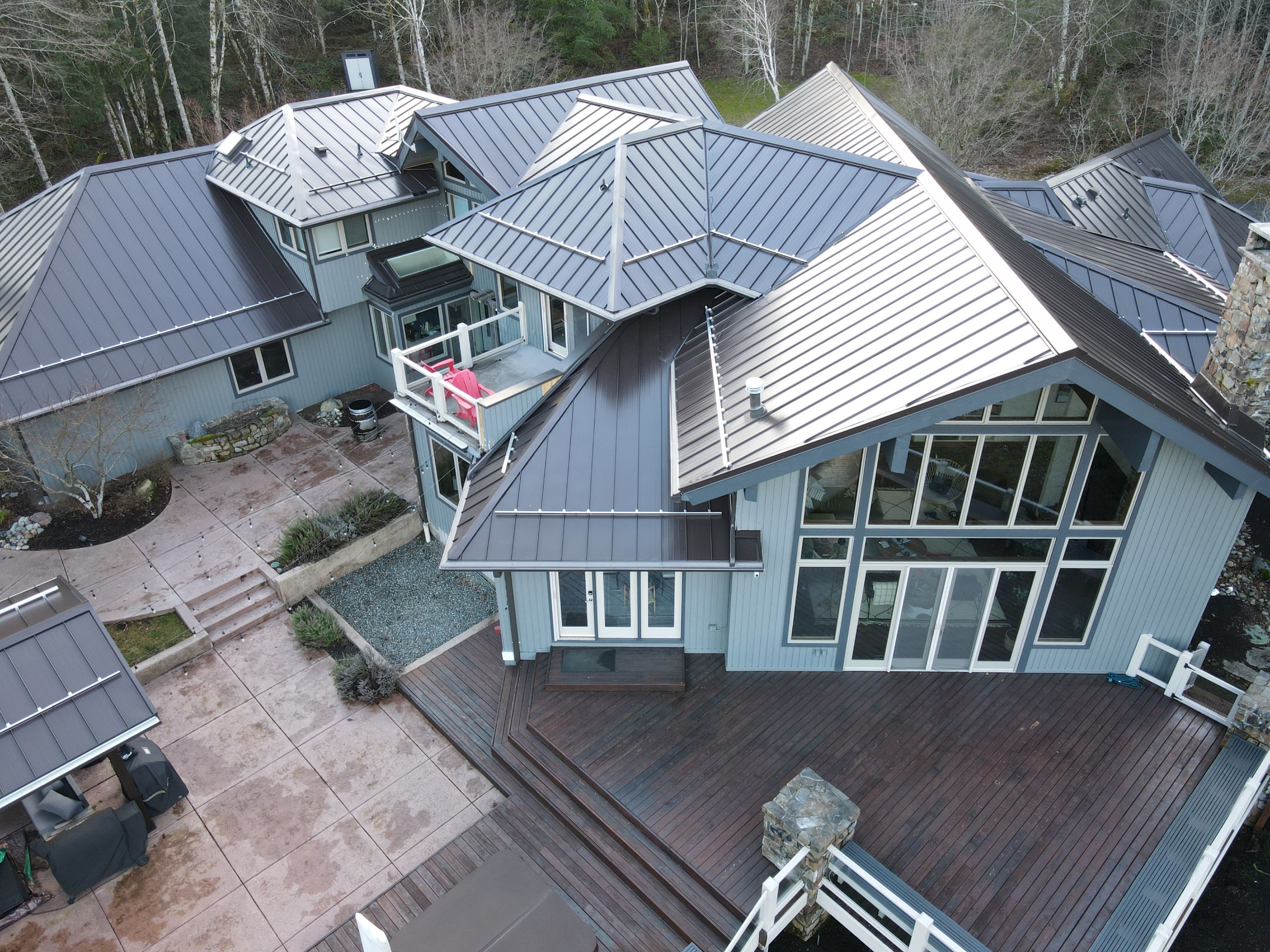 North Bend Roof Replacement using Standing Seam Metal - Dark Bronze by RoofSmart