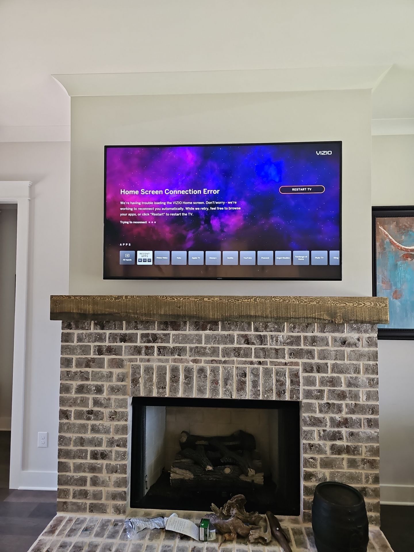 Fireplace TV Mounting Projects by Hangman Mounting & Installation 