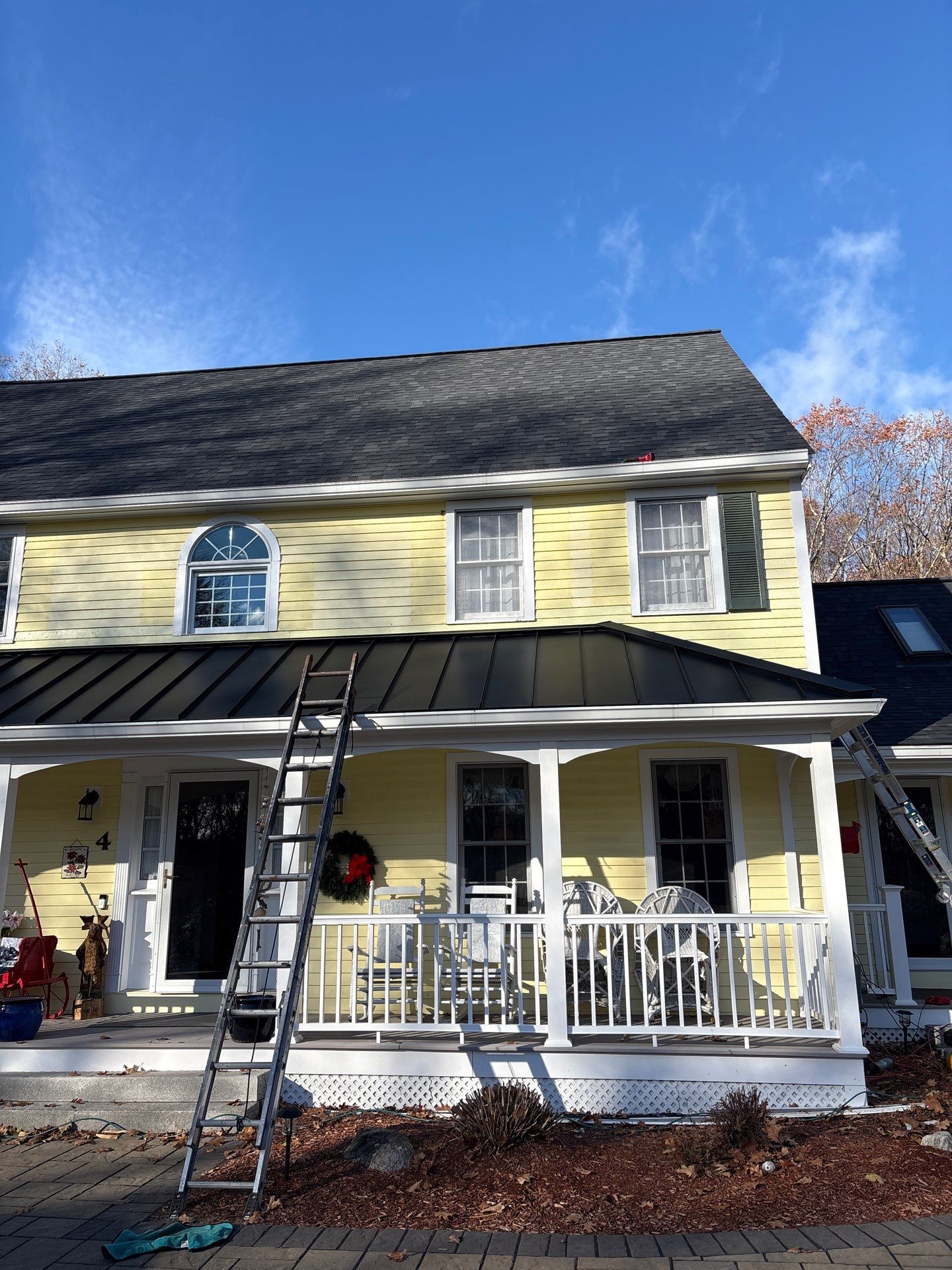 Chelmsford Premium Roof: Onyx Black Shingles with Standing Seam Metal Porch by Mighty Dog Roofing of Greater Middlesex County