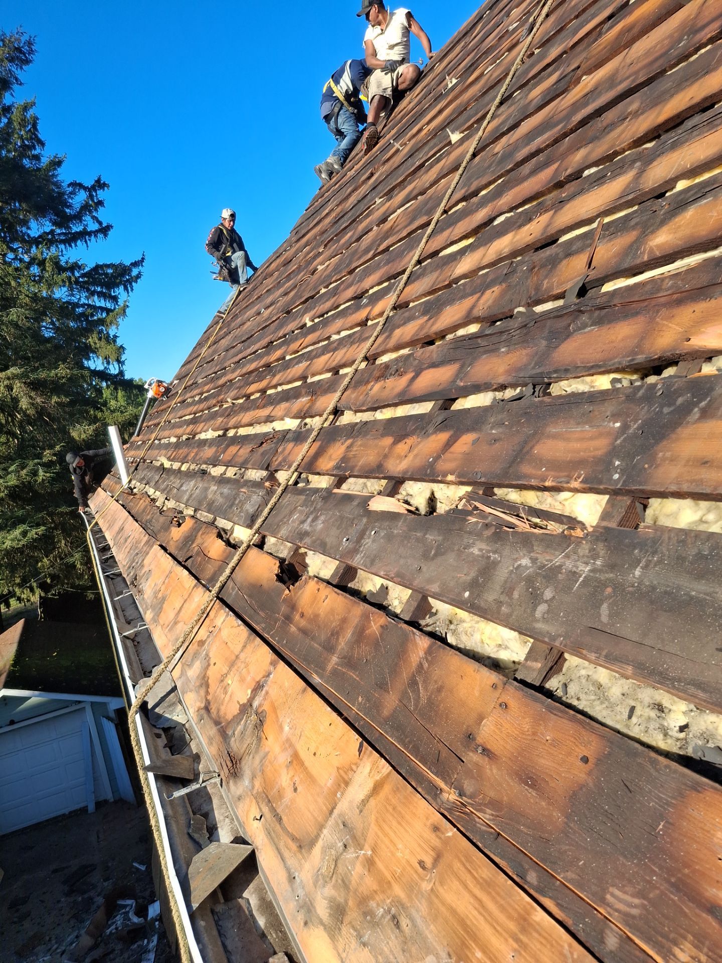 Residential Roofing Installation using GAF Timberline HDZ Oyster Grey by Rainstoppers Roofing